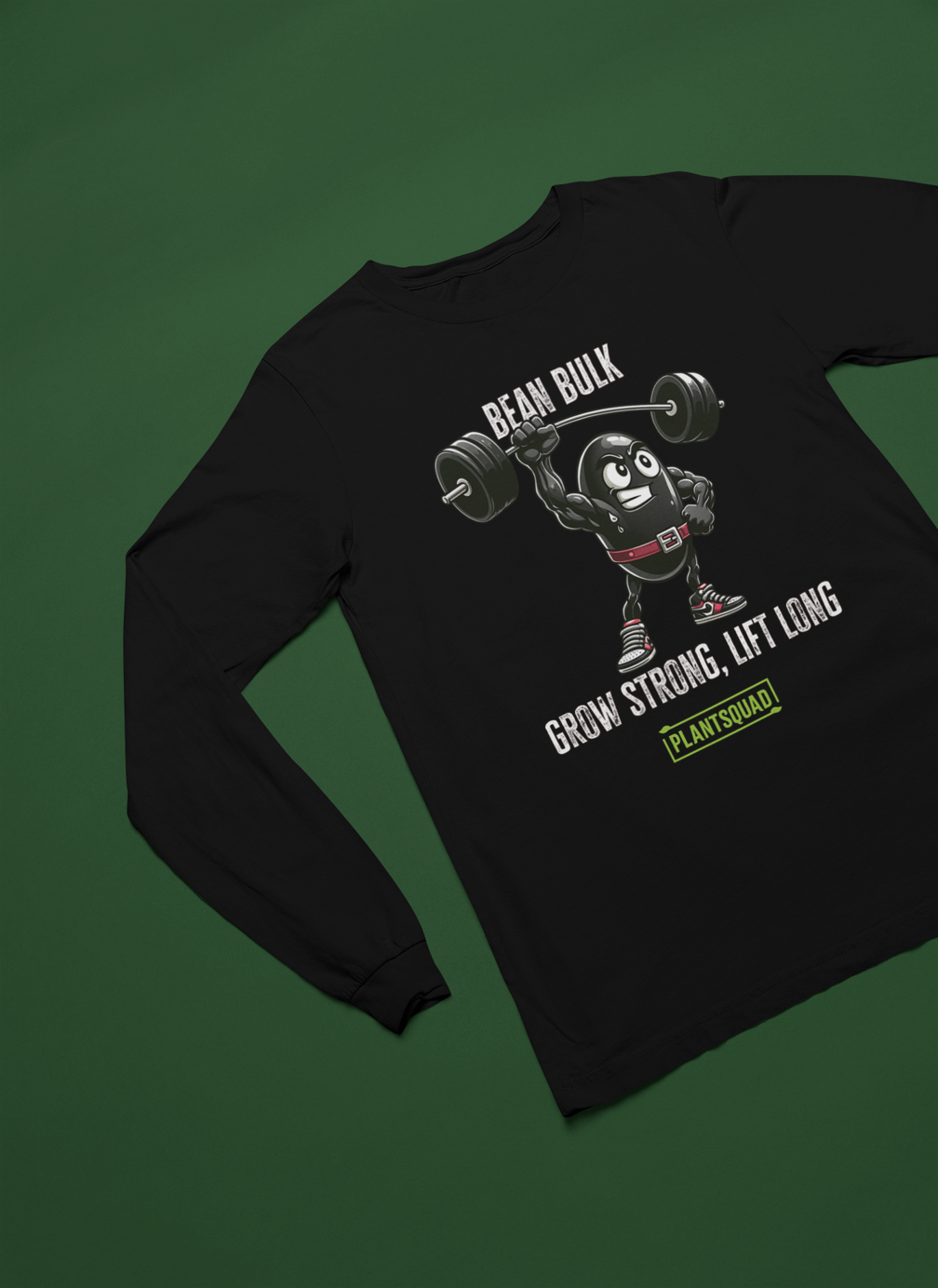 A black long-sleeve shirt, the Plantsquad Black Bean "Bean Bulk Grow Strong Lift Long" - Unisex Long Sleeve T-Shirt, features a cartoon bean character lifting weights with the text "Bean Bulk" above it. Below the character, the text reads "Grow Strong, Lift Long" and "PlantSquad." Perfect for fitness enthusiasts embracing a vegan lifestyle.