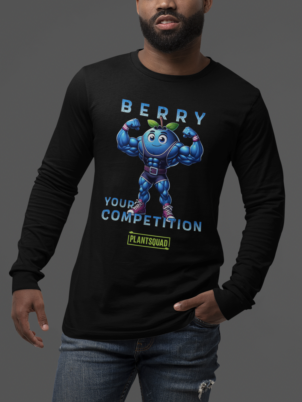 A Plantsquad Blueberry "Berry Your Competition" - Unisex Long Sleeve T-Shirt featuring a muscly blueberry cartoon character flexing its arms, with the text "BERRY YOUR COMPETITION" above and below it, and "PLANTSQUAD" written in a green box beneath the character. Ideal for fitness enthusiasts embracing the vegan lifestyle.