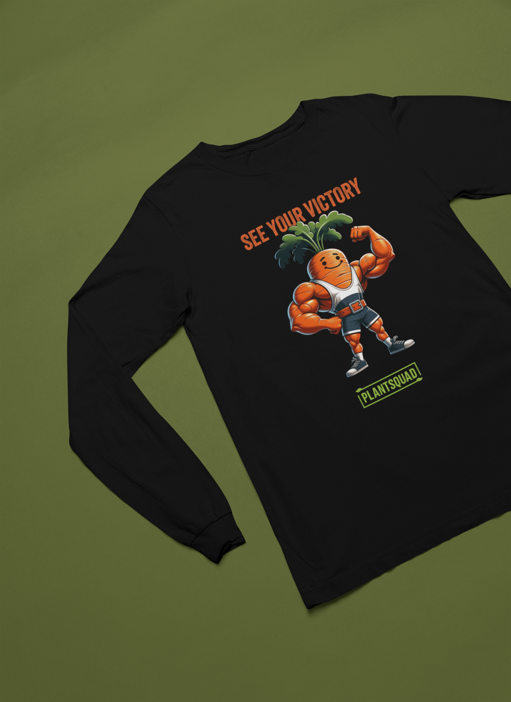 A Plantsquad Carrot "See Your Victory" - Unisex Long Sleeve T-Shirt featuring an illustration of a muscular carrot character flexing its arm muscles. The text above the character reads "SEE YOUR VICTORY," and the text below reads "PLANTSQUAD." Perfect for fitness enthusiasts embracing a vegan lifestyle.