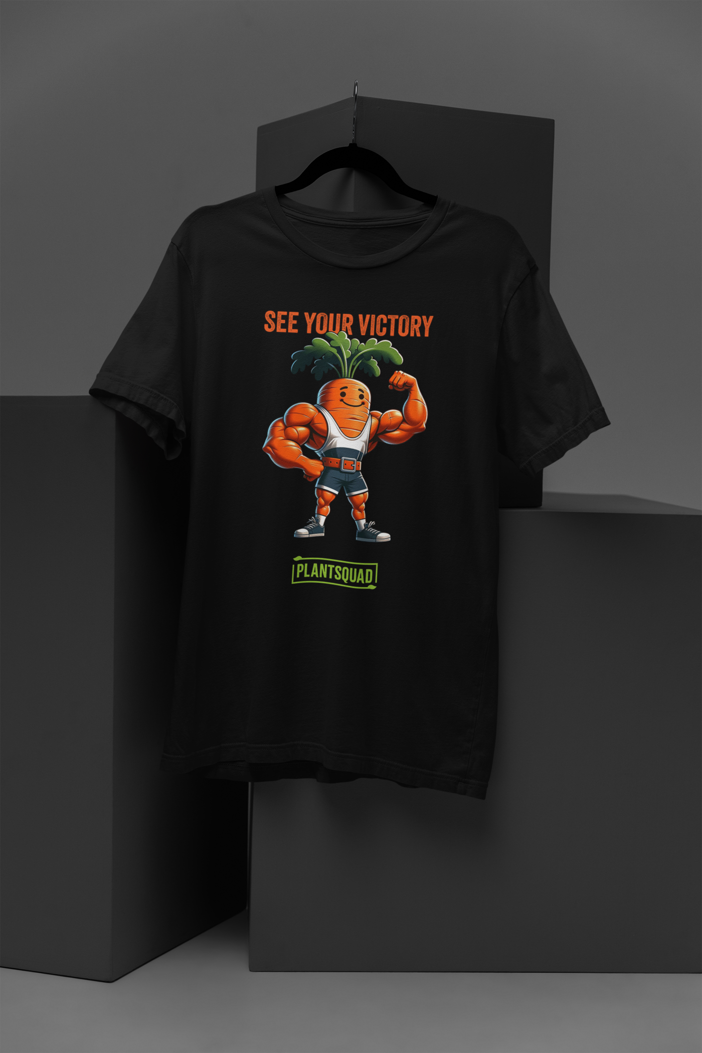 A Plantsquad Carrot "See Your Victory" - Unisex T-Shirt showcasing a muscular, anthropomorphic carrot flexing its arms. The carrot, with green leafy hair and an orange body, stands proudly beneath the text "SEE YOUR VICTORY" and above "PLANTSQUAD." Join the #plantsquad movement in style!
