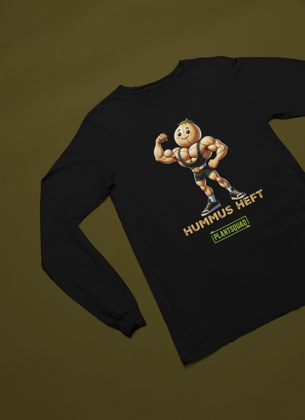 A black long-sleeve shirt displays a muscular cartoon chickpea character flexing its arms. Below the character, the text reads "Hummus Heft" followed by "Plantsquad" in a green box. Perfect for fitness enthusiasts embracing a vegan lifestyle, this Plantsquad Chickpea "Hummus Heft" - Unisex Long Sleeve T-Shirt celebrates plant-based power.