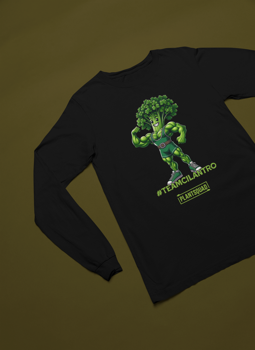 Here's the revised sentence:
A Plantsquad Cilantro "Team Cilantro" - Unisex Long Sleeve T-Shirt featuring an illustration of a muscular anthropomorphic broccoli character wearing a championship belt. Perfect for fitness enthusiasts, the text "#TEAMCILANTRO" is prominently displayed below the character, along with "PLANTSQUAD" in a green box beneath it.