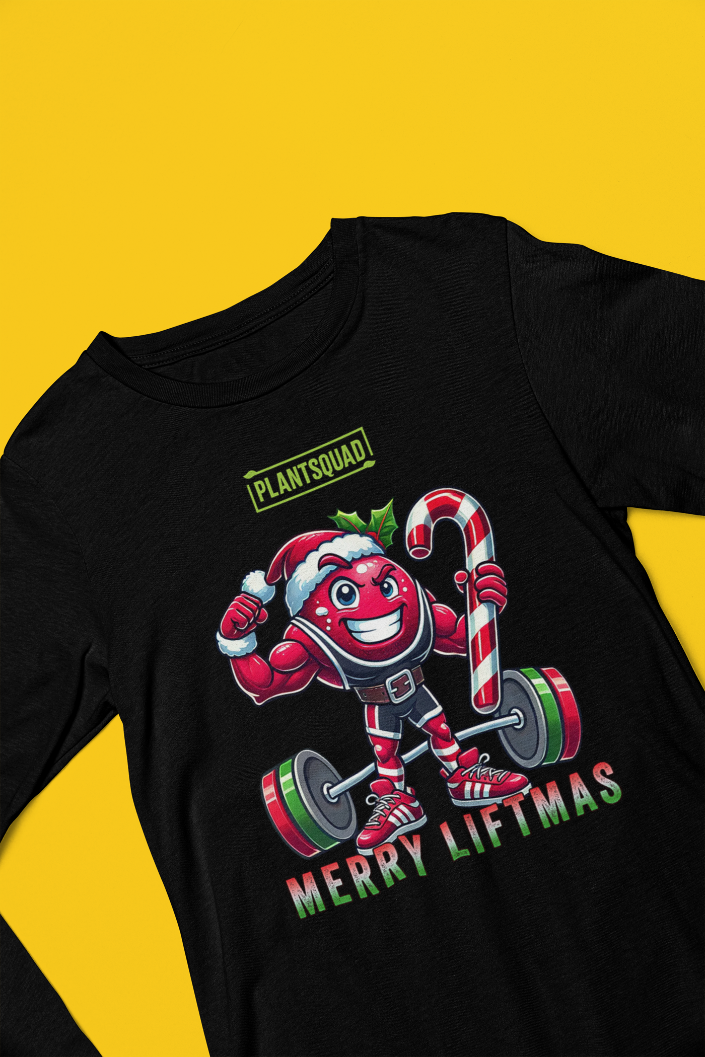 A picture of a tank top featuring a strong looking cranberry cartoon character flexing its arms holding a candy cane. A small green logo "PLANTSQUAD" appears above the character, "MERRY LIFTMAS" below. Perfect for those embracing a plant-based or vegan lifestyle that are into fitness