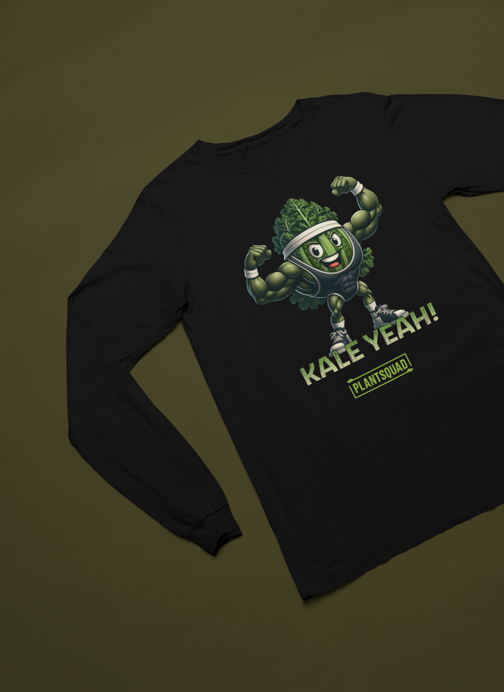 The Plantsquad Kale "Kale Yeah!" - Unisex Long Sleeve T-Shirt is a black, long-sleeve shirt featuring a cartoon kale character with muscular arms, wearing a headband and flexing. Perfect for fitness enthusiasts embracing the vegan lifestyle, the playful design boasts "KALE YEAH!" and "PLANTSQUAD" text beneath the character.