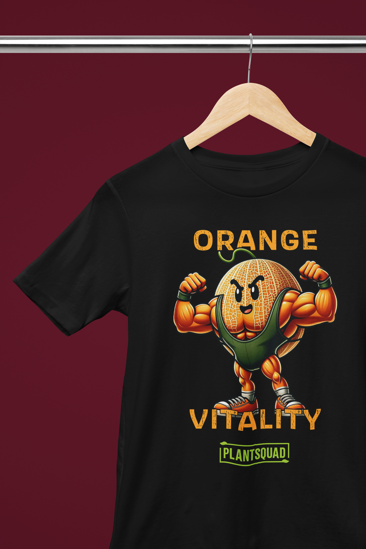 A black T-shirt featuring a muscular orange cartoon flexing its arms, wearing green shorts. Above the illustration, the text reads "ORANGE VITALITY" and below it, there's a green box with "PLANTSQUAD" written inside. Perfect for those embracing a plant-based lifestyle. Introducing the Plantsquad Rockmelon "Orange Vitality" - Unisex T-Shirt.
