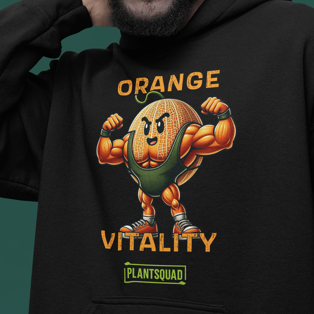 A person wearing a black hoodie featuring an illustration of a muscular, anthropomorphic orange flexing its arms. The text "ORANGE VITALITY" is above and below the orange character, with "PLANTSQUAD" at the bottom.