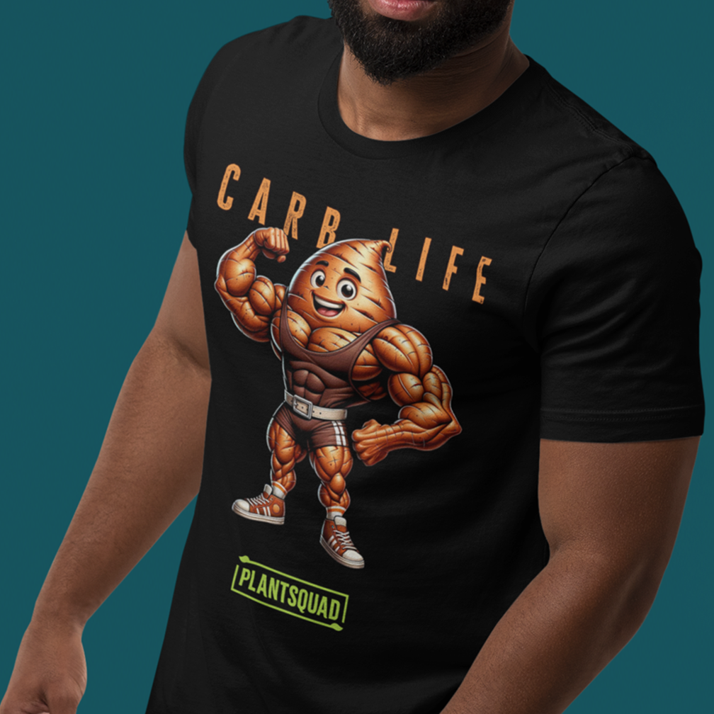 A man wearing a black T-shirt with a muscular cartoon potato flexing its biceps. The shirt features the text "CARB LIFE" above the potato and "PLANTSQUAD" below it. The background is teal.