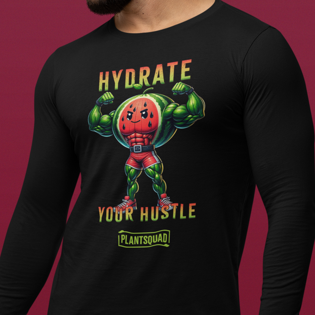 A person is wearing a black long-sleeve shirt with a colorful graphic of a muscular watermelon character flexing its biceps. The text on the shirt reads "HYDRATE YOUR HUSTLE" in bold letters with "Plantsquad" at the bottom. The background is maroon.