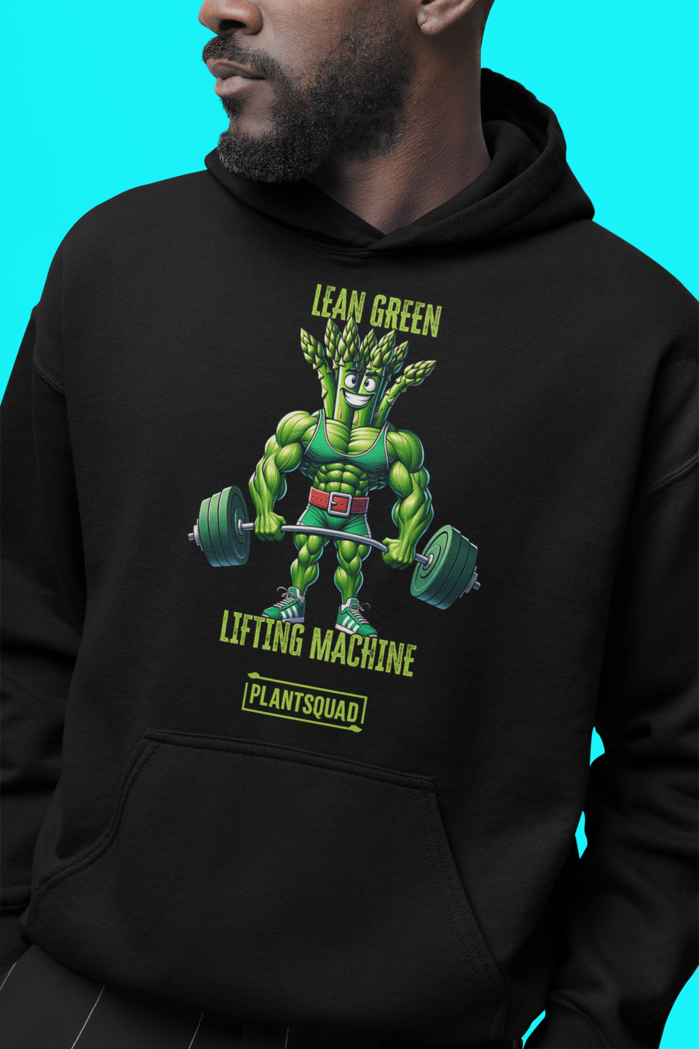 A black weight lifting hoodie featuring a muscular, green, humanoid plant character lifting two large dumbbells. Above the character are the words "Lean Green Lifting Machine" in green, and "PLANT SQUAD" is written below. Perfect vegan gym apparel for those embracing a plant-based lifestyle. Introducing the Plantsquad Asparagus "Lean Green Lifting Machine" - Unisex Hoodie.