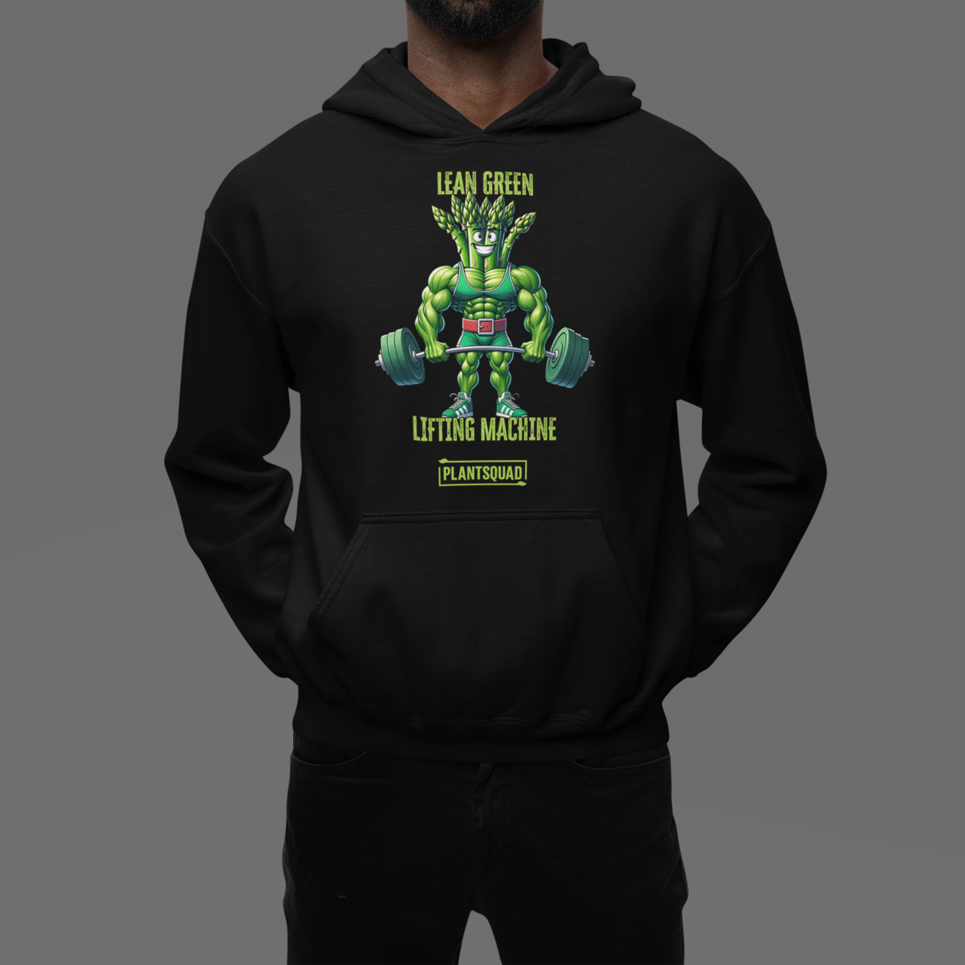 A black weight lifting hoodie featuring a muscular, green, humanoid plant character lifting two large dumbbells. Above the character are the words "Lean Green Lifting Machine" in green, and "PLANT SQUAD" is written below. Perfect vegan gym apparel for those embracing a plant-based lifestyle. Introducing the Plantsquad Asparagus "Lean Green Lifting Machine" - Unisex Hoodie.