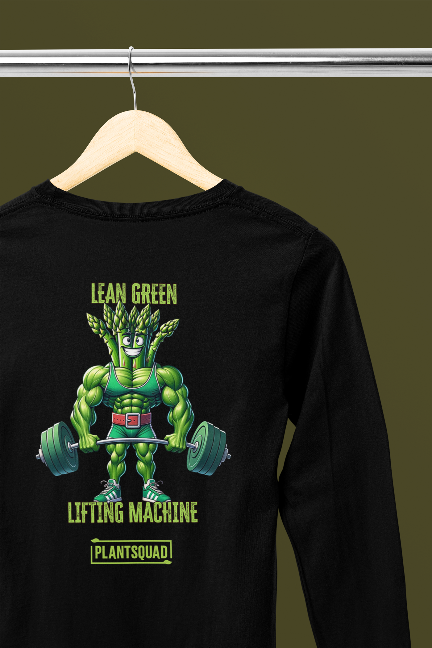 A Plantsquad Asparagus "Lean Green Lifting Machine" - Unisex Long Sleeve T-Shirt featuring an illustration of a muscular, anthropomorphic plant lifting dumbbells. The text above reads, "Lean Green Lifting Machine," and below, "Plantsquad," both in green lettering—a perfect fit for those embracing a plant-based lifestyle or vegan fitness.