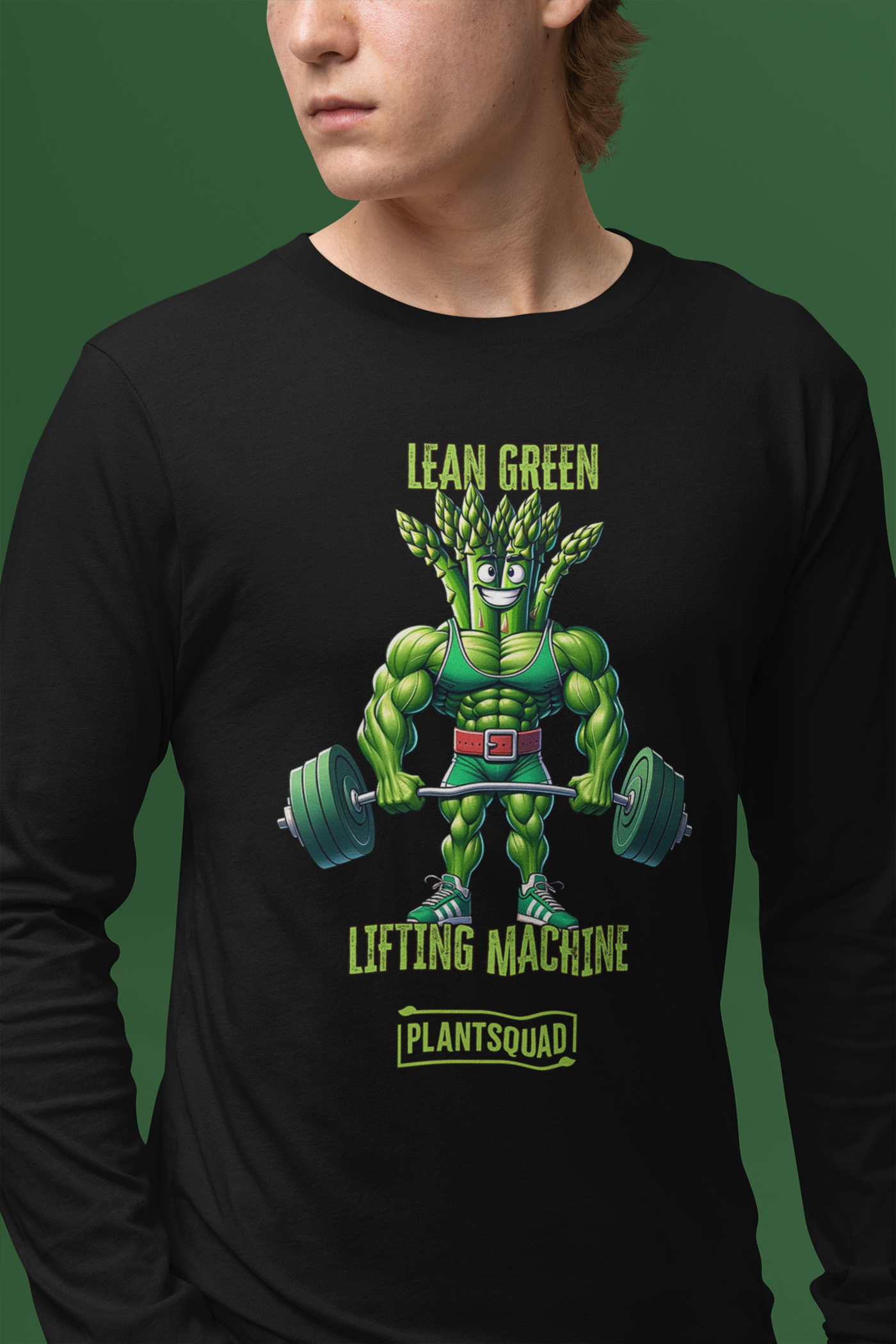 A Plantsquad Asparagus "Lean Green Lifting Machine" - Unisex Long Sleeve T-Shirt featuring an illustration of a muscular, anthropomorphic plant lifting dumbbells. The text above reads, "Lean Green Lifting Machine," and below, "Plantsquad," both in green lettering—a perfect fit for those embracing a plant-based lifestyle or vegan fitness.