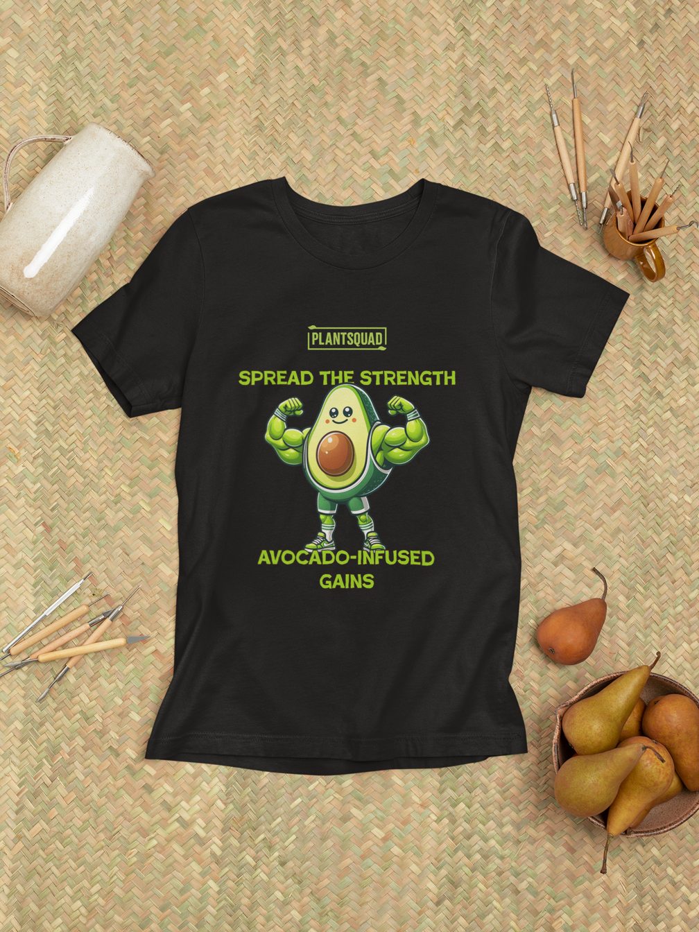 A black Plantsquad Avocado "Spread The Strength Avocado-Infused Gains" - Unisex T-Shirt featuring a muscular, cartoon avocado character with fists raised. Text above and below the character reads "PLANTSQUAD," "SPREAD THE STRENGTH," and "AVOCADO-INFUSED GAINS" in bright green lettering.