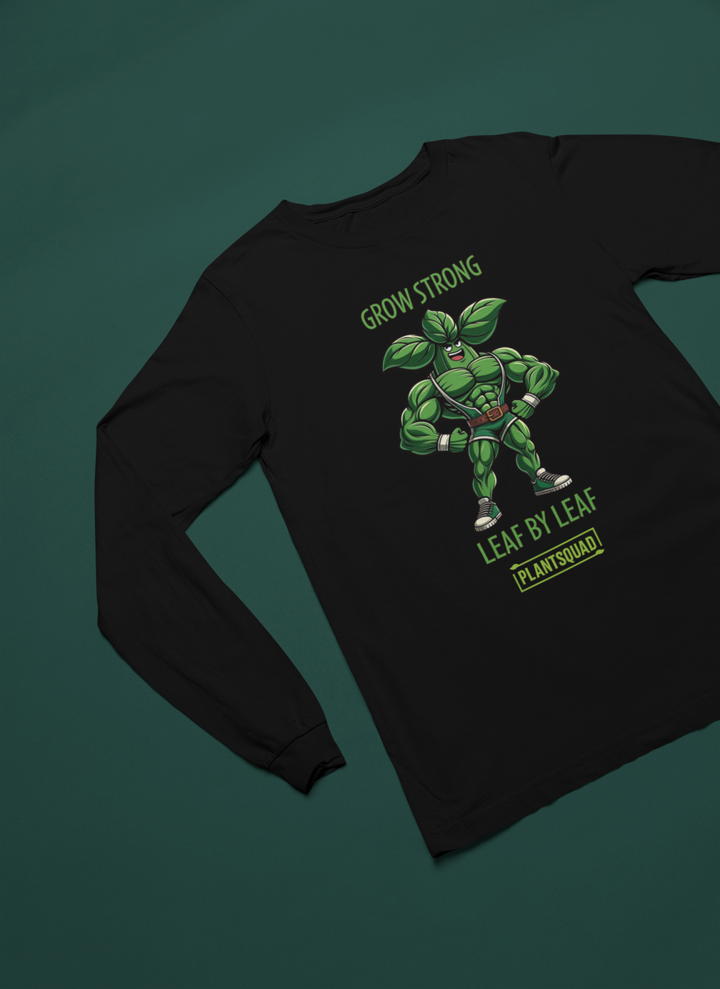 A black long-sleeve t-shirt featuring an illustration of a muscular, anthropomorphic green leaf superhero. Above the image is the text "GROW STRONG," and below it reads "LEAF BY LEAF." The bottom features the word "PLANTSQUAD," perfect for those embracing a vegan lifestyle or seeking plant-based clothing. Introducing the Plantsquad Basil "Grow Strong Leaf By Leaf" - Unisex Long Sleeve T-Shirt.