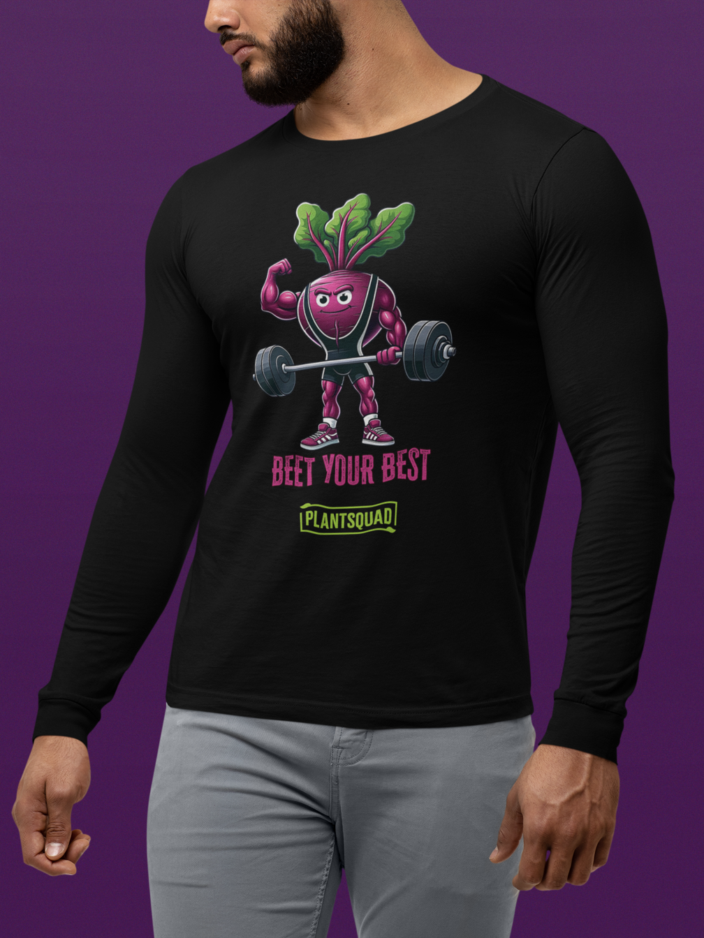 Plantsquad Beetroot "Beet Your Best" - Unisex Long Sleeve T-Shirt featuring a muscly beetroot cartoon lifting barbells. Text below the beet reads, "Beet Your Best" in pink, with "PLANTSQUAD" in a green box underneath. The beet character wears sneakers and earphones, promoting a fun vegan fitness and plant-based lifestyle.