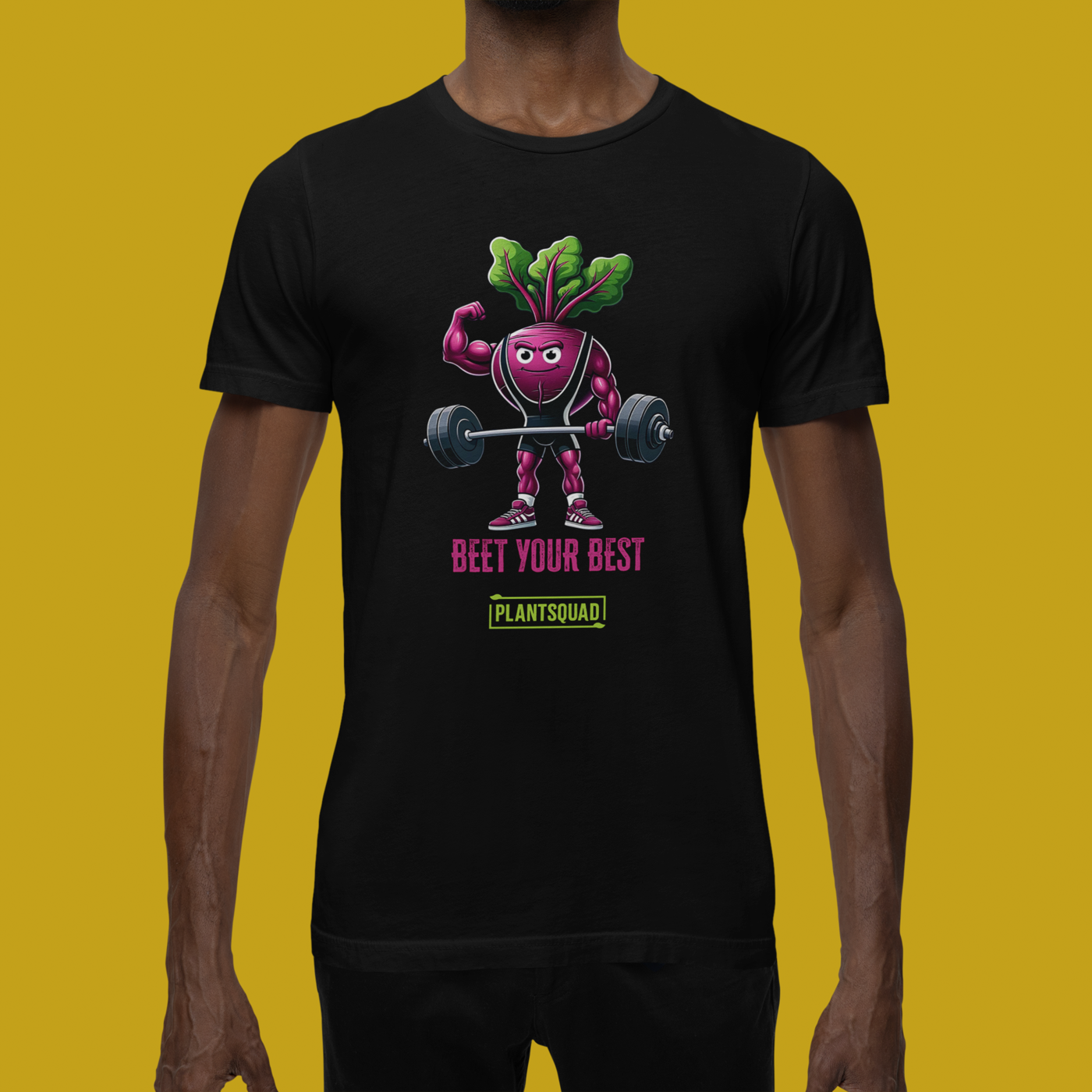 A Plantsquad Beetroot "Beet Your Best" - Unisex T-Shirt featuring a cartoon beetroot lifting weights with a determined expression. Above the beetroot, the text reads, "BEET YOUR BEST," while below it, "PLANTSQUAD" is showcased in a green box.