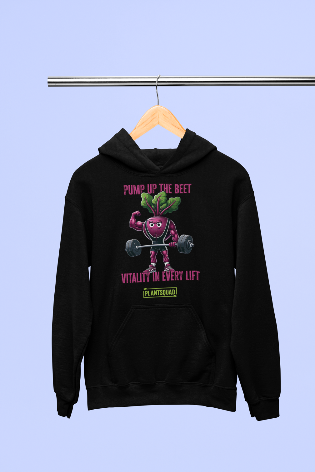 A Plantsquad Beetroot "Pump Up The Beet Vitality In Every Lift" - Unisex Hoodie featuring a muscular beetroot design lifting dumbbells. Above the beet, the text reads "PUMP UP THE BEET," and below it says "VITALITY IN EVERY LIFT." Made from cozy fabric, it perfectly complements your vegan lifestyle. The logo "PLANT SQUAD" is printed at the bottom.