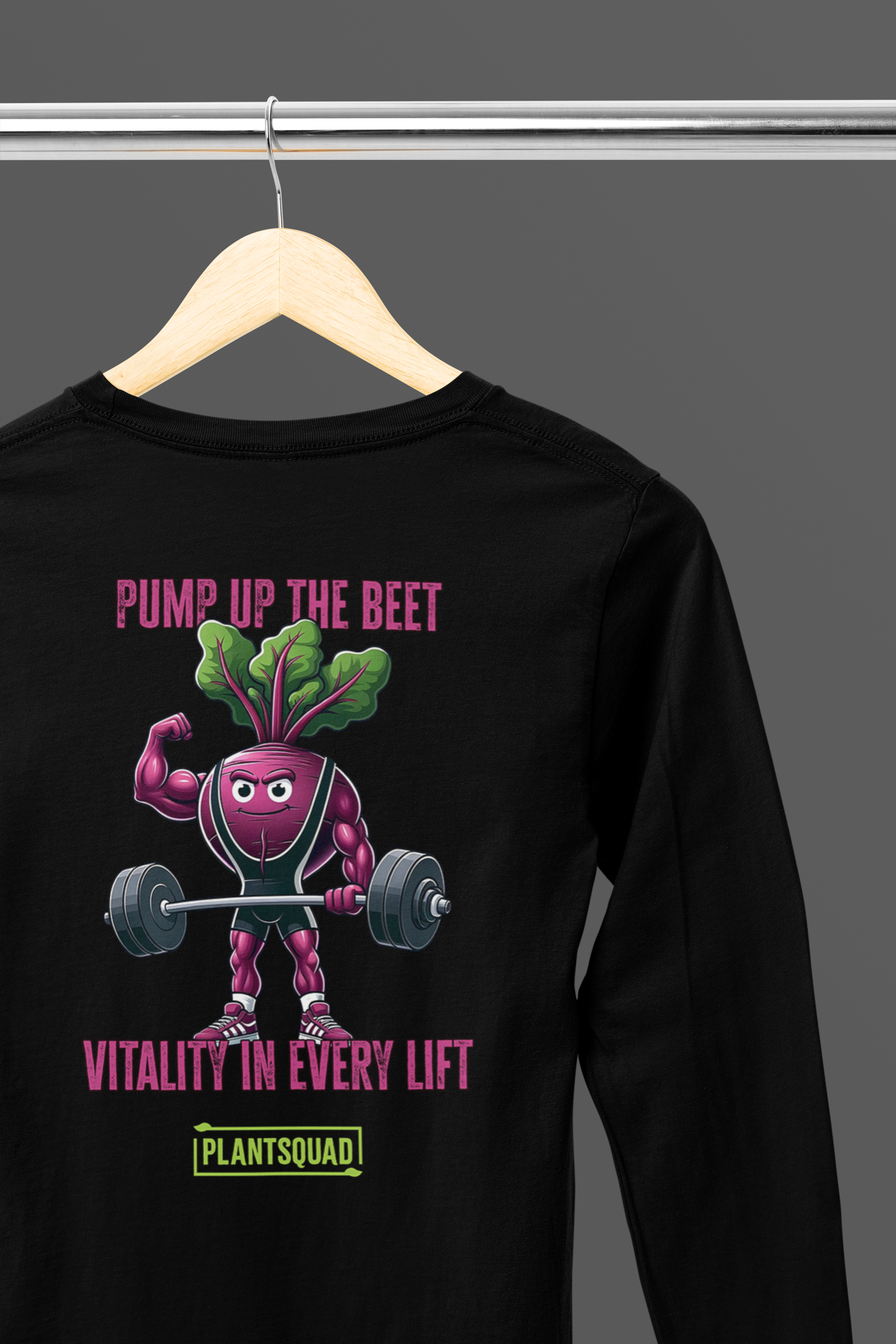 Black long-sleeve shirt featuring a weight-lifting beetroot cartoon with the text "Pump Up the Beet" above and "Vitality in Every Lift" below. The bottom includes the text "Plantsquad" within a green rectangle, perfect for those embracing a plant-based lifestyle or vegan fitness apparel. Introducing: **Plantsquad Beetroot "Pump Up The Beet Vitality In Every Lift" - Unisex Long Sleeve T-Shirt**.