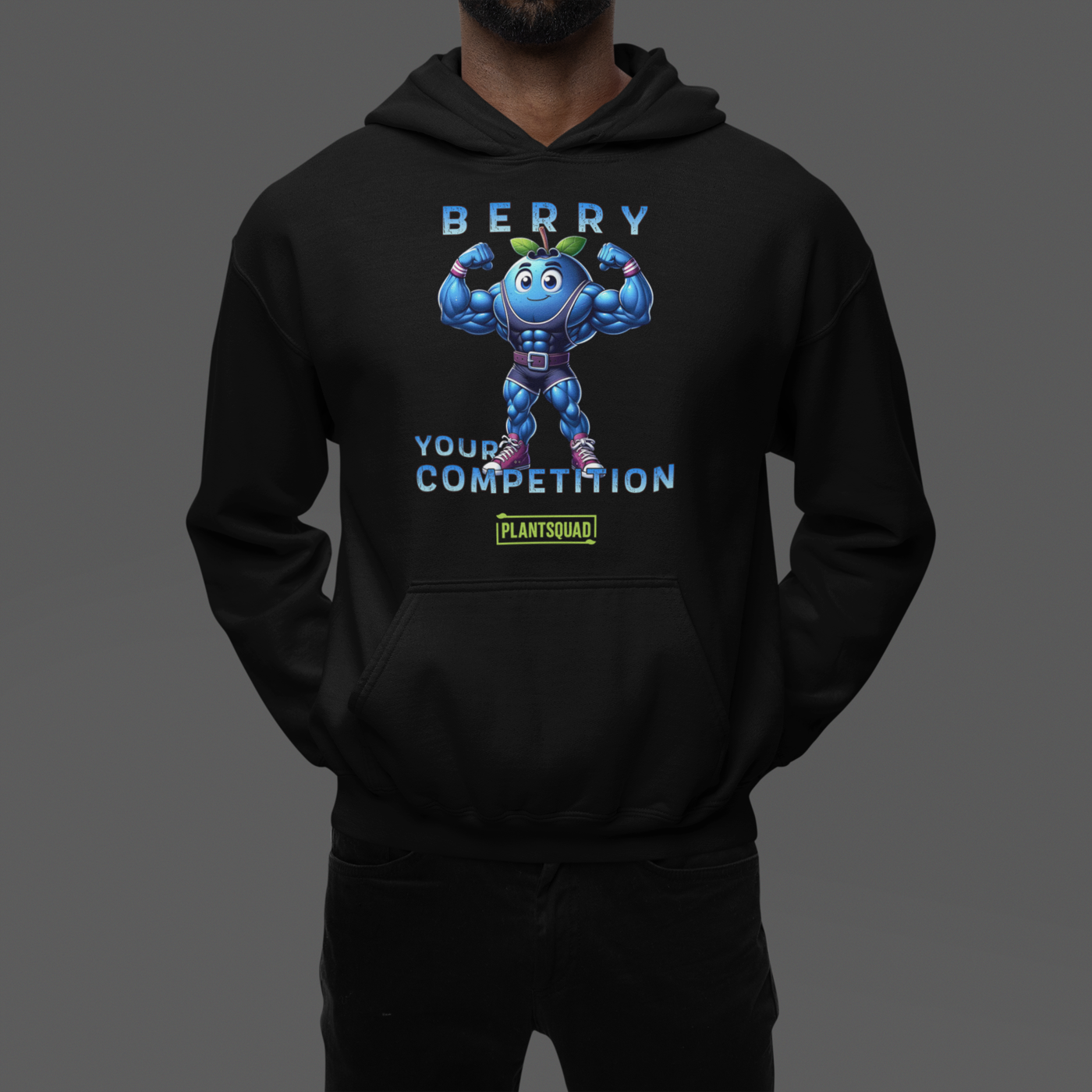 This Plantsquad Blueberry "Berry Your Competition" - Unisex Hoodie features a muscular blueberry cartoon flexing its arms. Above, the text reads "BERRY," and below, "YOUR COMPETITION" is written. A small green and yellow label with the word "PLANTSQUAD" is at the bottom, perfect for those embracing a plant-based lifestyle.