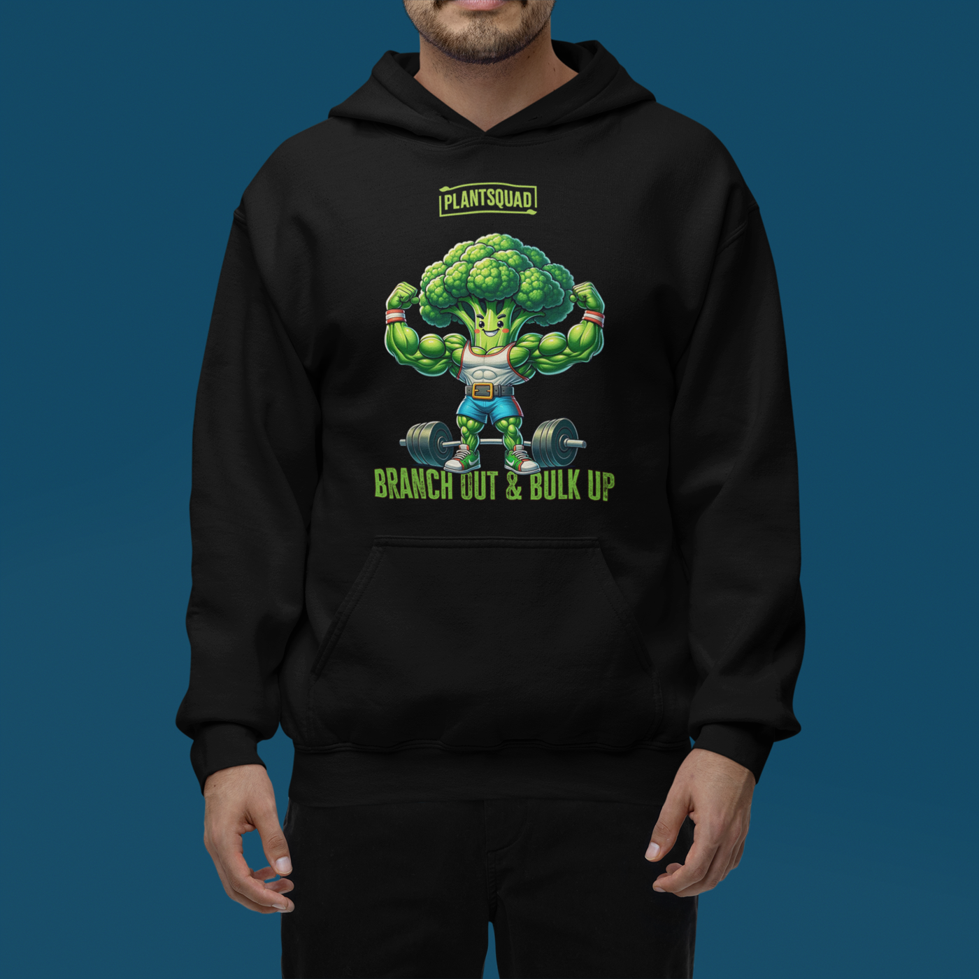 A Plantsquad Broccoli "Branch Out & Bulk Up" - Unisex Hoodie made from cozy fabric features an illustration of a muscular, anthropomorphic broccoli lifting dumbbells. The text above reads "PLANTSQUAD" and below reads "BRANCH OUT & BULK UP!" Perfect for those embracing a vegan lifestyle, the hoodie has a front pocket and a drawstring hood.