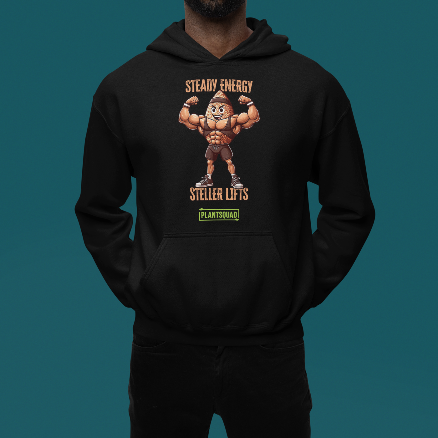 A Plantsquad Brown Rice "Steady Energy Steller Lifts" - Unisex Hoodie featuring a muscular cartoon peanut flexing its arms. Above the peanut, the text reads "STEADY ENERGY," and below it, "STELLER [sic] LIFTS." Made from cozy fabric, it embraces the vegan lifestyle with a green rectangular logo at the bottom that says "PLANTSQUAD.