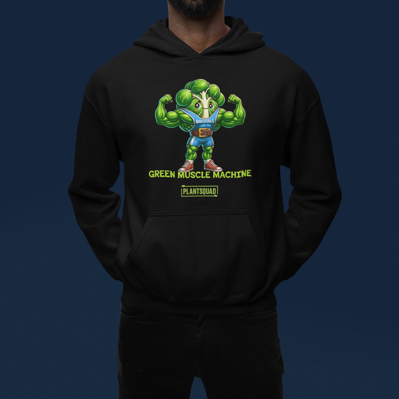 A black **Plantsquad Brussel Sprout "Green Muscle Machine" - Unisex Hoodie** featuring a muscular, anthropomorphic broccoli character flexing its arms. Text below the character reads "GREEN MUSCLE MACHINE" with "PLANTSQUAD" underneath—perfect for those embracing a plant-based lifestyle and seeking stylish vegan gym wear.