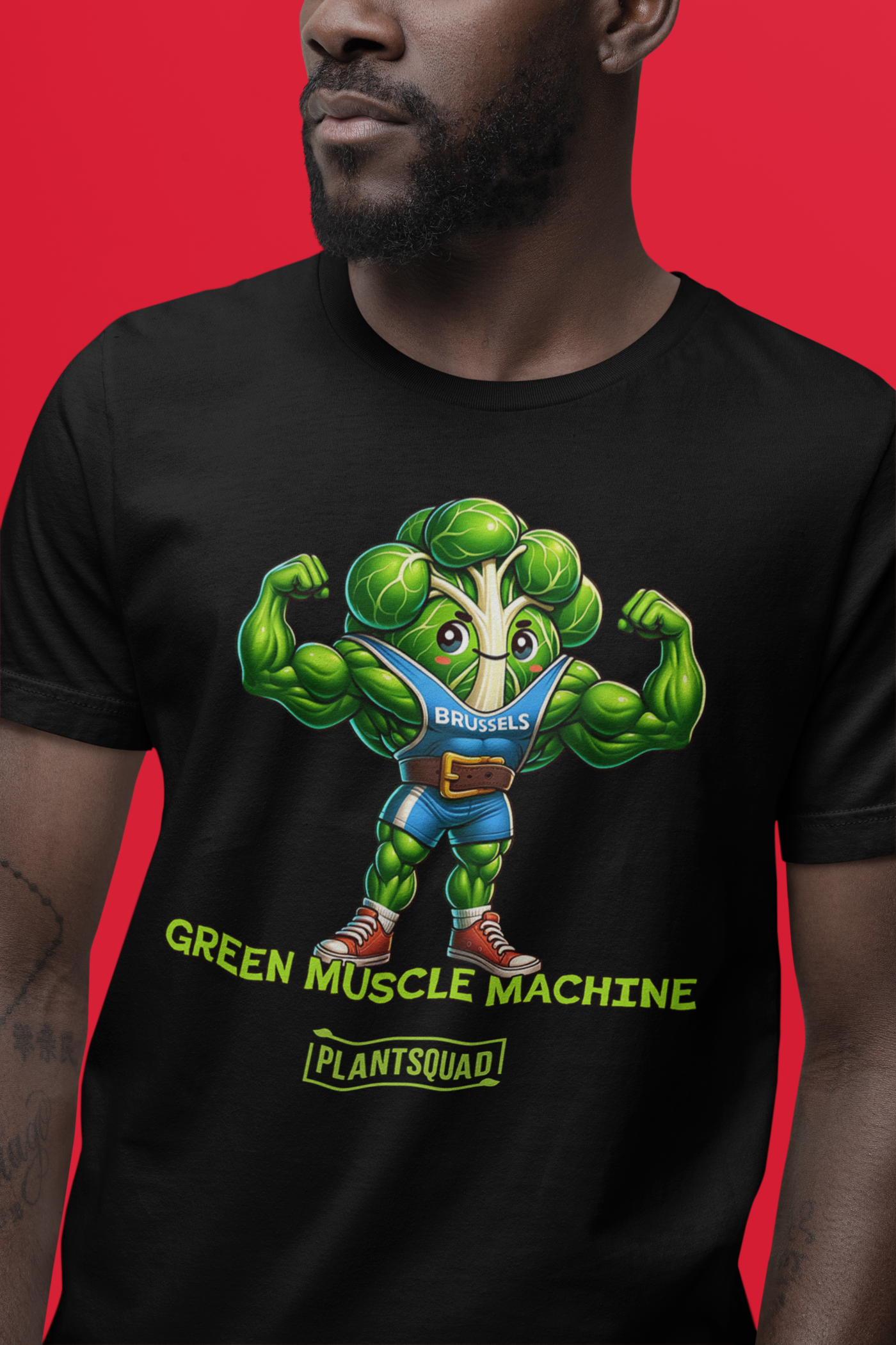 The Plantsquad Brussel Sprout "Green Muscle Machine" - Unisex T-Shirt showcases a muscular, anthropomorphic green broccoli character in a blue tank top flexing its arms. Below the character, the words "GREEN MUSCLE MACHINE" and "#PLANTSQUAD" are emblazoned in vibrant green text.