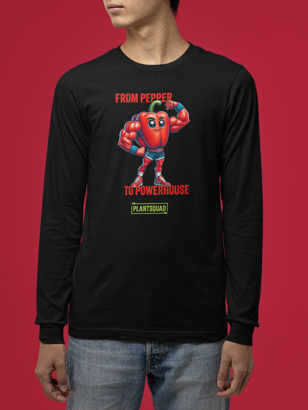 A Plantsquad Capscium "Red Hot Reps" - Unisex Long Sleeve T-Shirt perfect for fitness enthusiasts, featuring a cartoon image of a muscular chili pepper character flexing its arms. Text below the image reads "RED HOT REPS" in red letters, and underneath is the "PLANTSQUAD" logo in green, celebrating a vegan lifestyle.