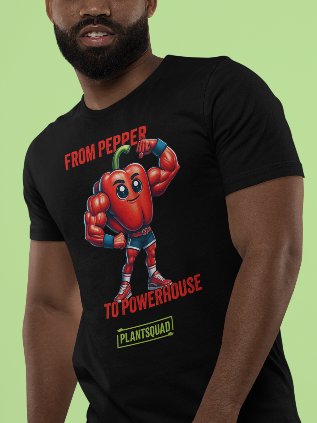 The Plantsquad Capsicum "From Pepper To Powerhouse" - Unisex T-Shirt features a muscular cartoon red bell pepper wearing a superhero outfit with a blue mask and gloves. The text above the character reads "FROM PEPPER TO POWERHOUSE" and below it, #PLANTSQUAD is displayed in a green box.