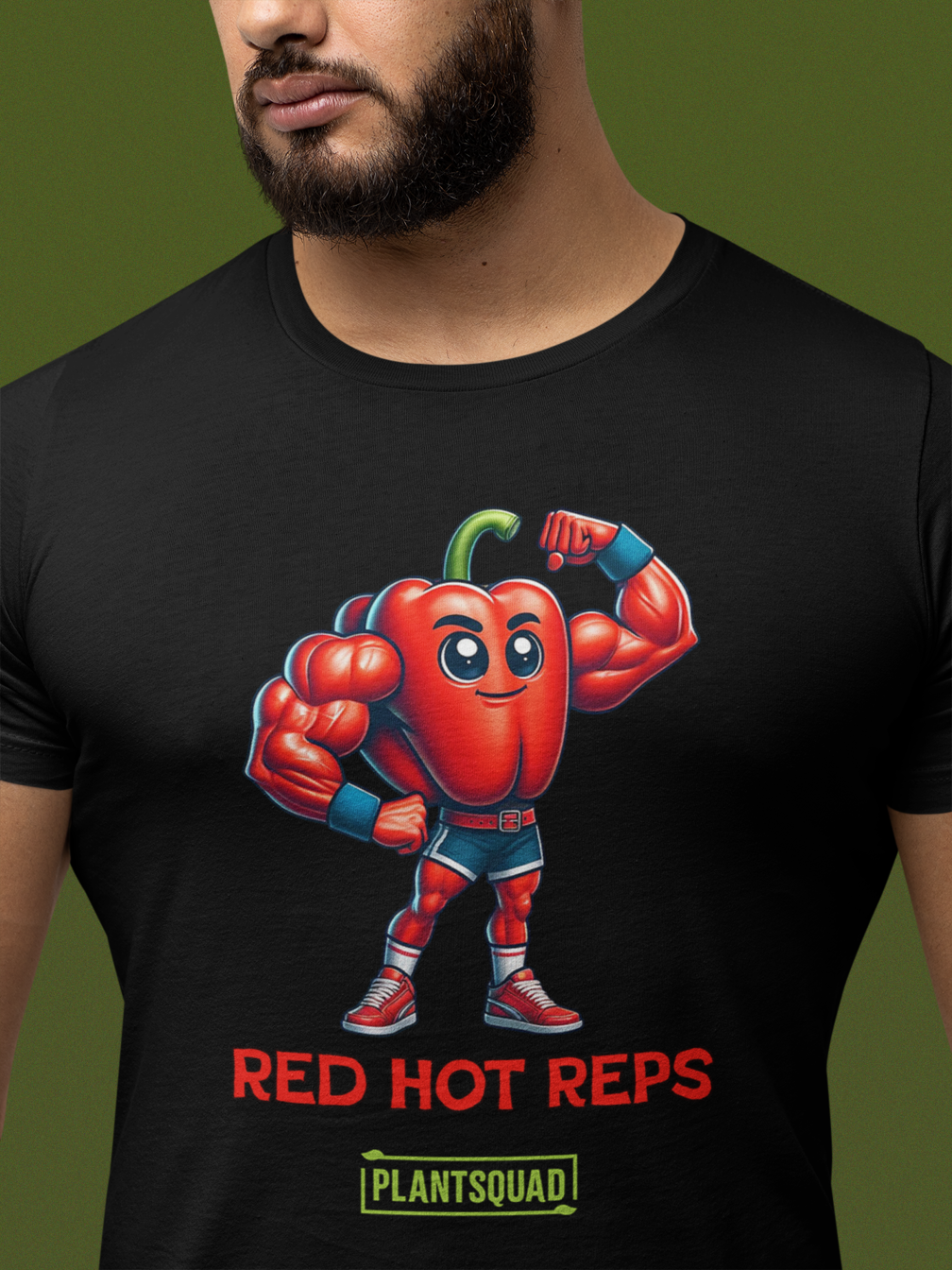 A Plantsquad Capsicum "Red Hot Reps" - Unisex T-Shirt featuring an illustration of a muscular red pepper character flexing its arms. Below the character are the words "RED HOT REPS" in bold red letters, and "PLANTSQUAD" in vibrant green text with a yellow border, showcasing your love for fitness and plant power.