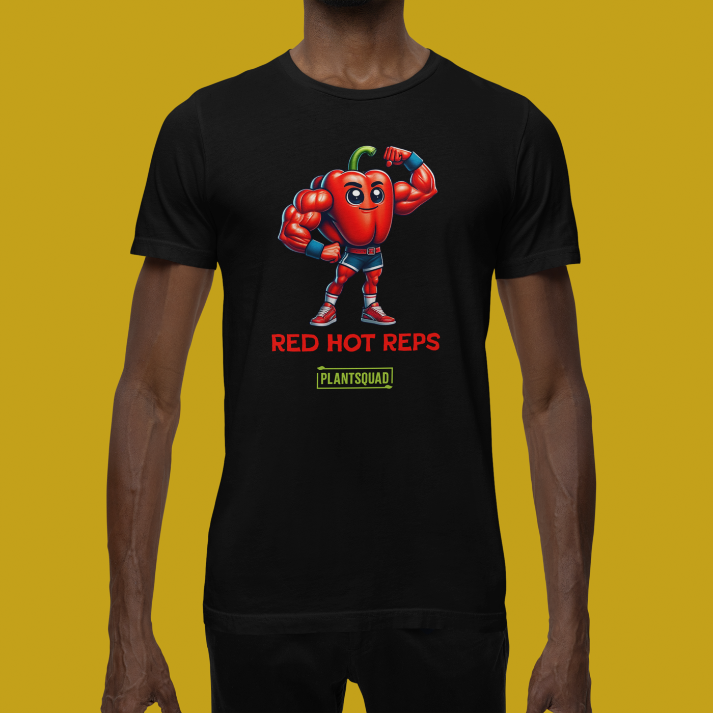 A Plantsquad Capsicum "Red Hot Reps" - Unisex T-Shirt featuring an illustration of a muscular red pepper character flexing its arms. Below the character are the words "RED HOT REPS" in bold red letters, and "PLANTSQUAD" in vibrant green text with a yellow border, showcasing your love for fitness and plant power.