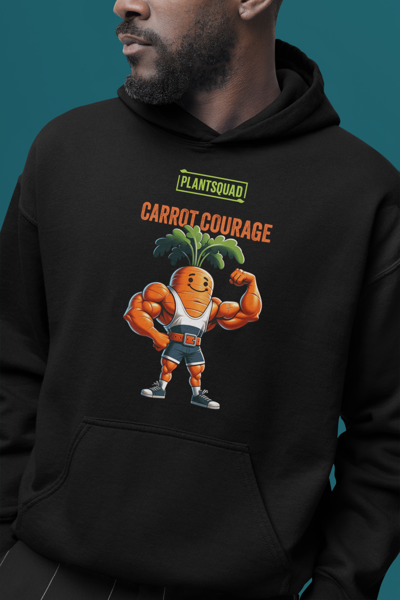 A Plantsquad Carrot "Carrot Courage" - Unisex Hoodie featuring a cartoon image of a muscular carrot character with green leafy hair, flexing its arms. Above the carrot, the text reads "PLANTSQUAD" and "CARROT COURAGE" in bold letters, perfect for those embracing the vegan lifestyle.