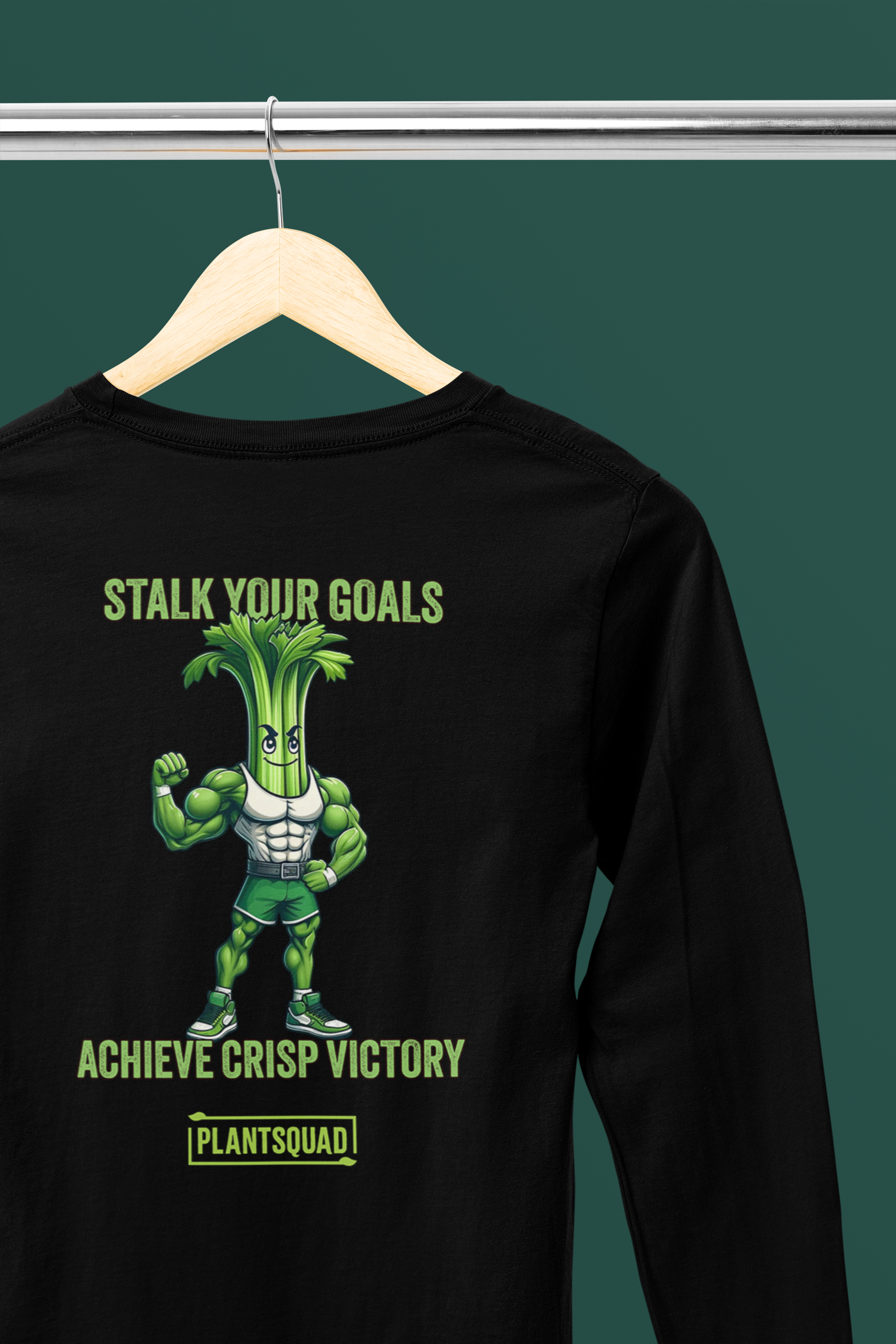 Plantsquad Celery "Stalk Your Goals Achieve Crisp Victory" - Unisex Long Sleeve T-Shirt: A black long-sleeve fitness shirt featuring a muscly celery cartoon flexing muscles with the text "Stalk Your Goals" above and "Achieve Crisp Victory" below. Perfect for embracing a vegan lifestyle, the words "Plantsquad" appear at the bottom.