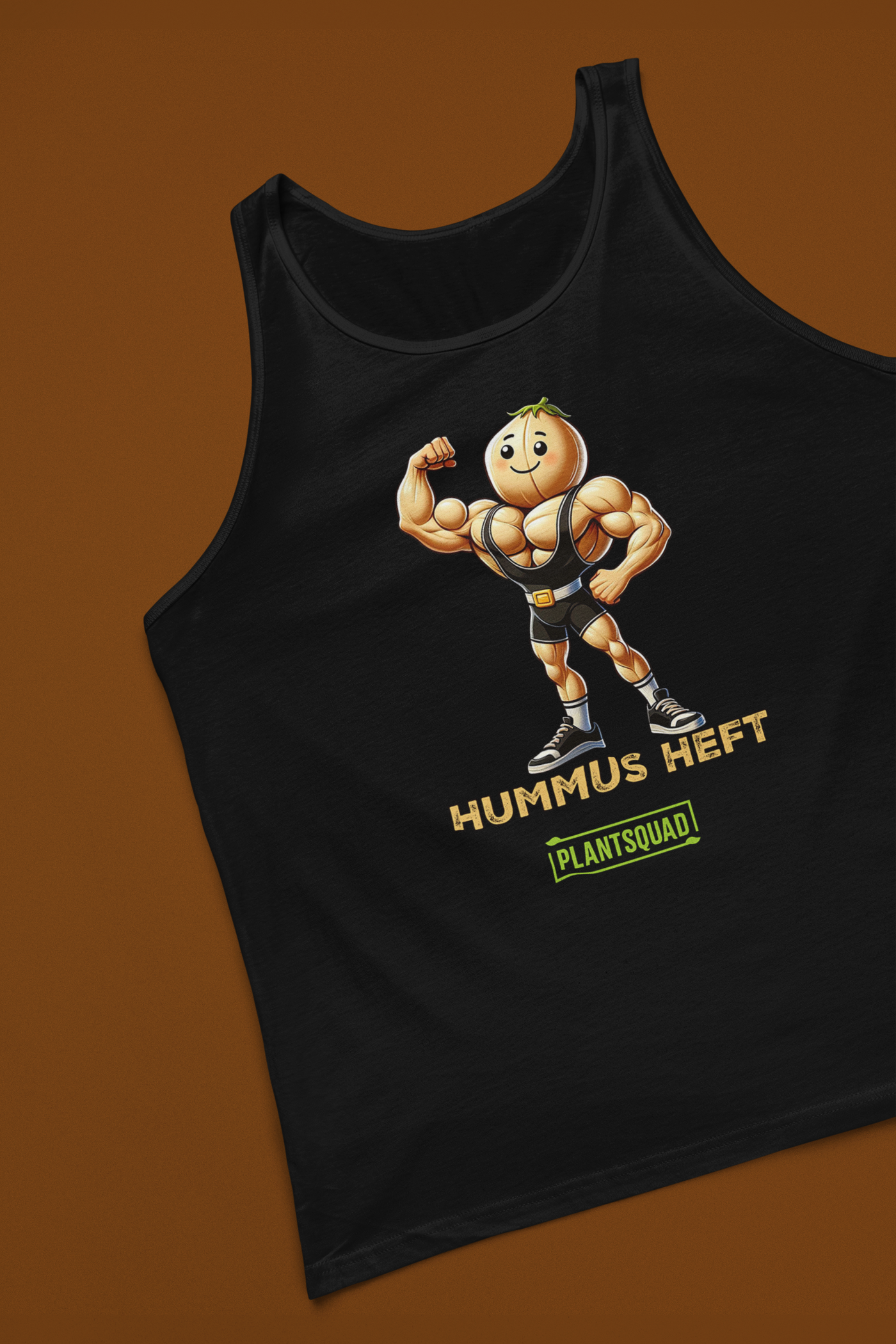 A black tank top made from breathable fabric, featuring an illustration of a muscular chickpea character flexing its arm, with the text "Hummus Heft" and a small green label reading "PlantSquad," perfect for a vegan workout tank top that celebrates the plant-based lifestyle can be replaced with Plantsquad Chickpea "Hummus Heft" - Unisex Tank Top.