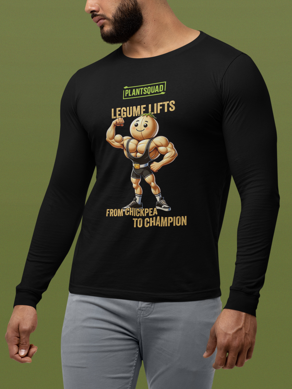 A Plantsquad Chickpea "Legume Lifts" - Unisex Long Sleeve T-Shirt featuring a muscly chickpea cartoon character flexing and wearing a weightlifting belt. The text above the character reads "PLANTSQUAD" and "Legume Lifts," and below, "From Chickpea to Champion." Perfect for fitness enthusiasts embracing the vegan lifestyle.