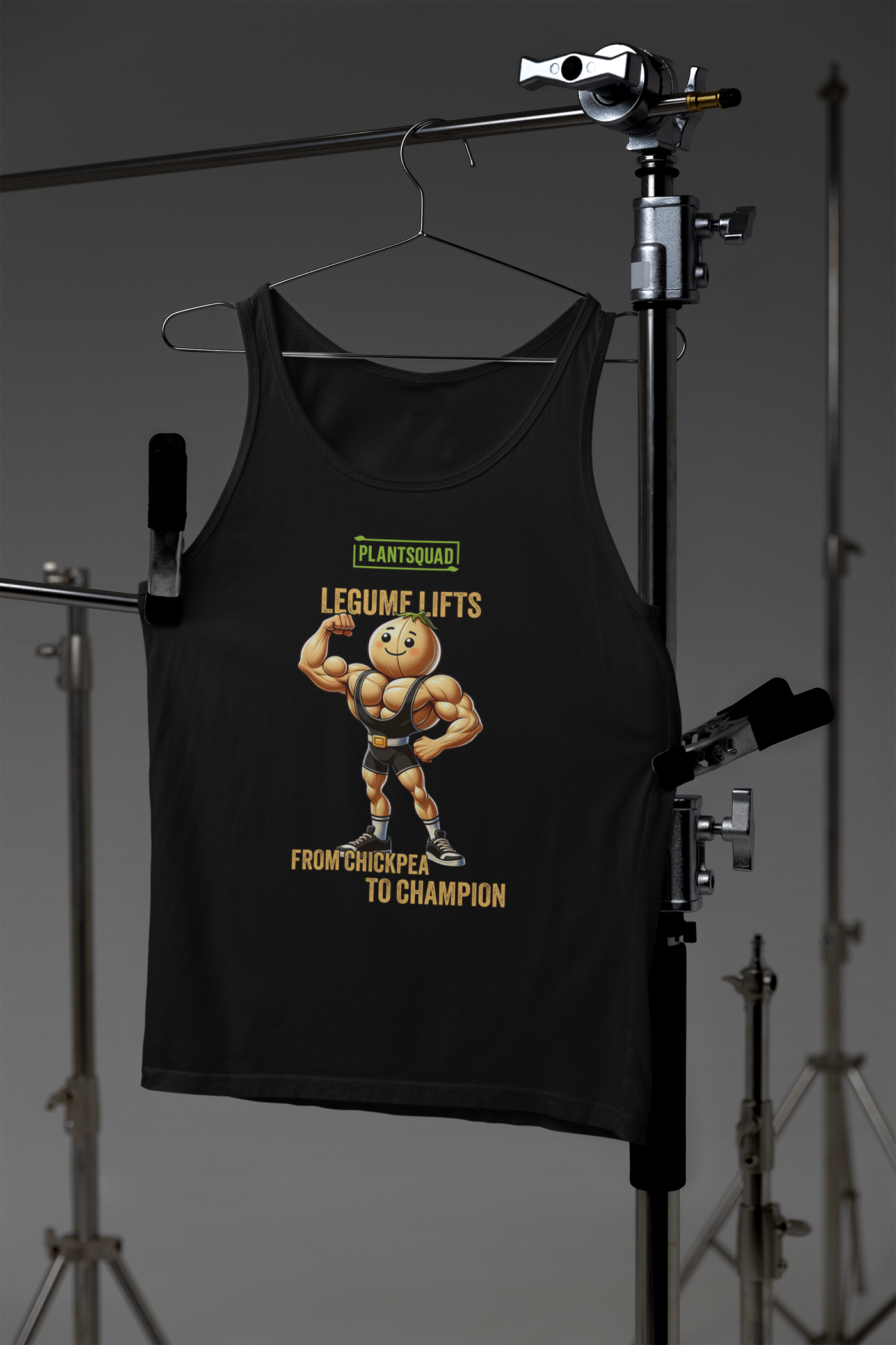 A Plantsquad Chickpea "Legume Lifts" - Unisex Tank Top with a cartoon image of a muscular chickpea flexing its biceps. The text above reads "PLANTSQUAD," and below the image, "LEGUME LIFTS - FROM CHICKPEA TO CHAMPION." Perfect for gym enthusiasts embracing the vegan lifestyle.