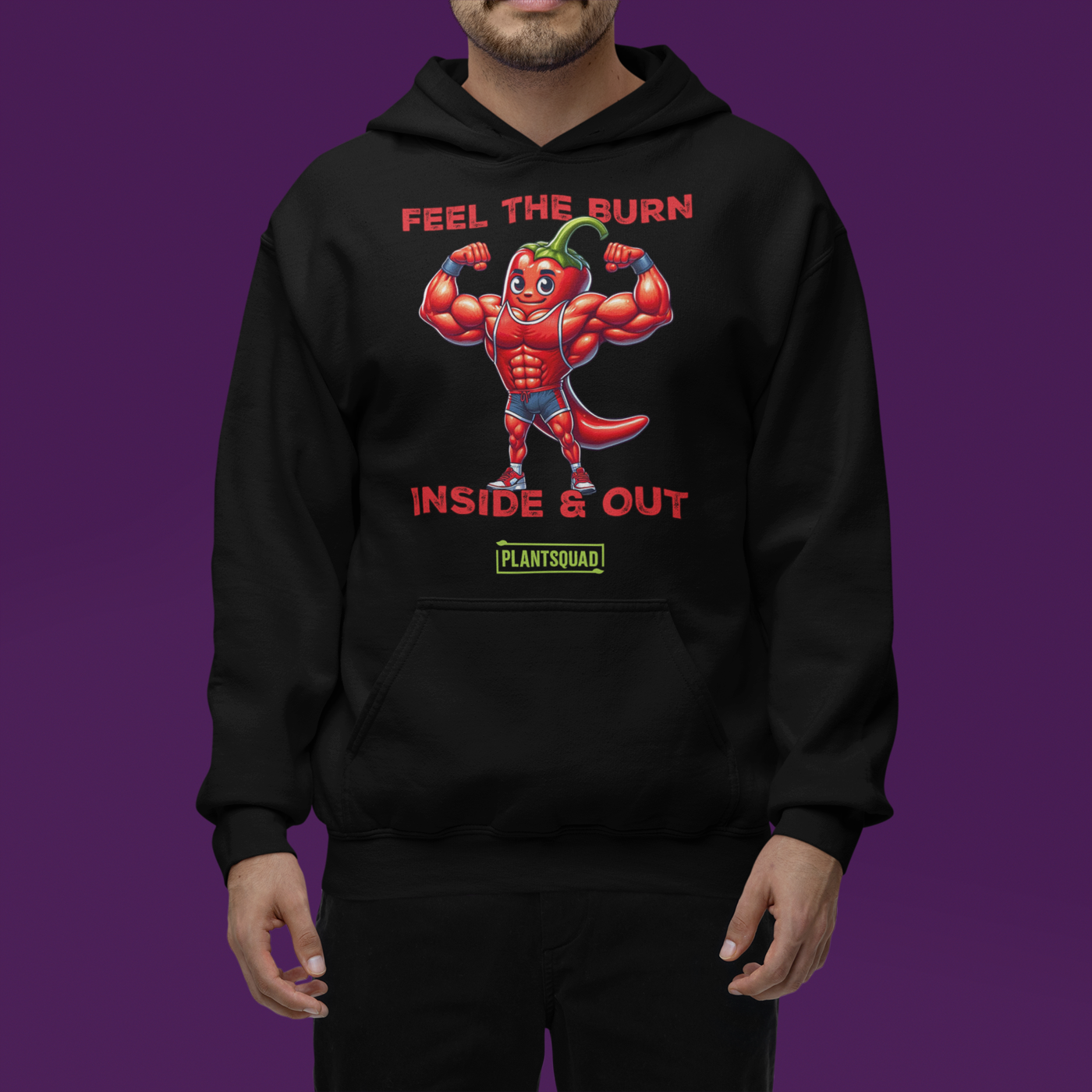 The Plantsquad Chilli "Feel The Burn Inside & Out" - Unisex Hoodie is a black weight lifting hoodie with a design of a muscular cartoon chili pepper flexing its muscles. The text above reads "Feel the Burn" and below it reads "Inside & Out." The bottom text features the logo "PlantSquad" in green and white, perfect for showcasing your plant-based, vegan lifestyle.