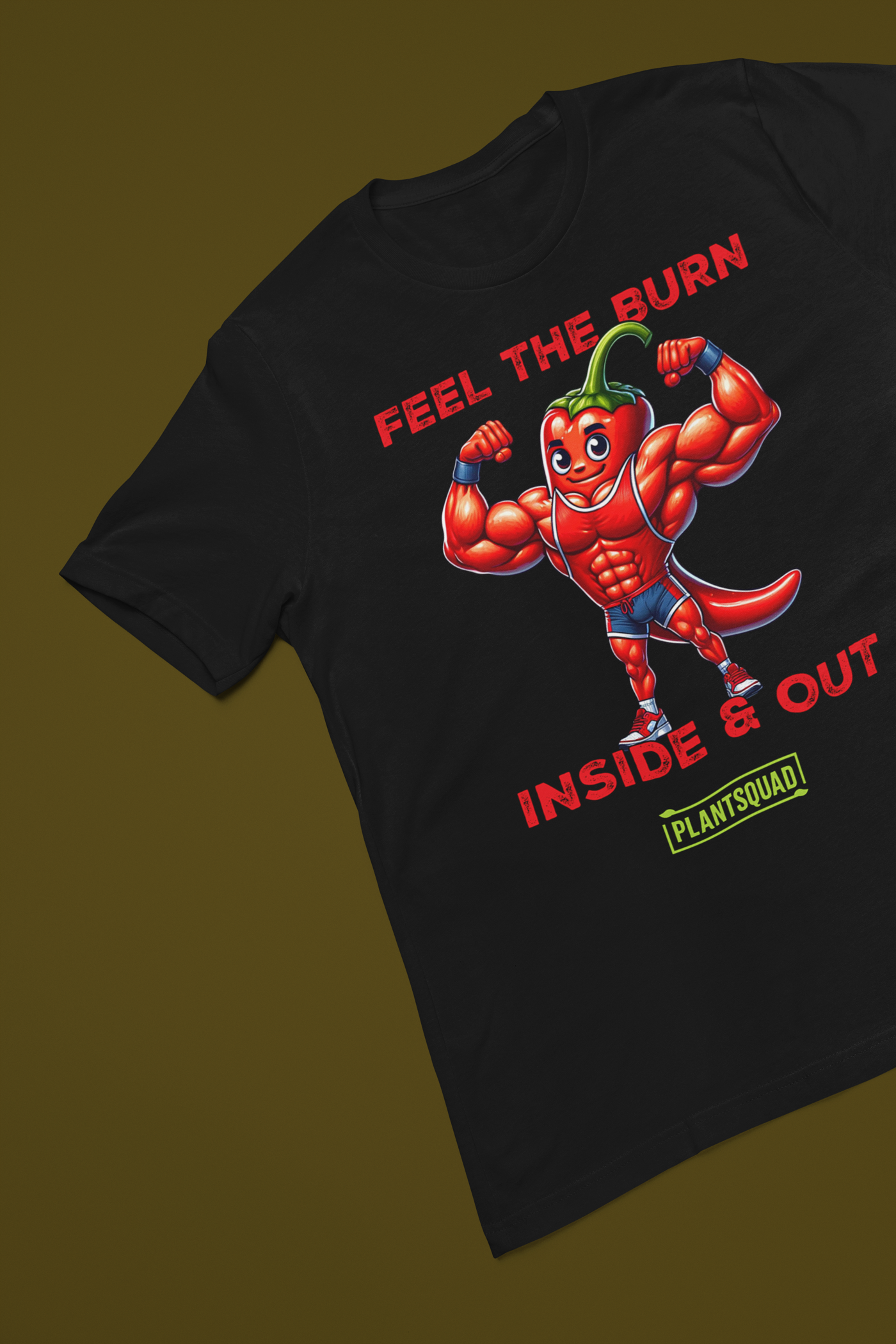 A black T-shirt showcases a muscular, flexing chili pepper character above bold red and white text that reads "FEEL THE BURN INSIDE & OUT". Below this, "Plantsquad Chilli 'Feel The Burn Inside & Out' - Unisex T-Shirt" is prominently featured inside a green rectangular box.