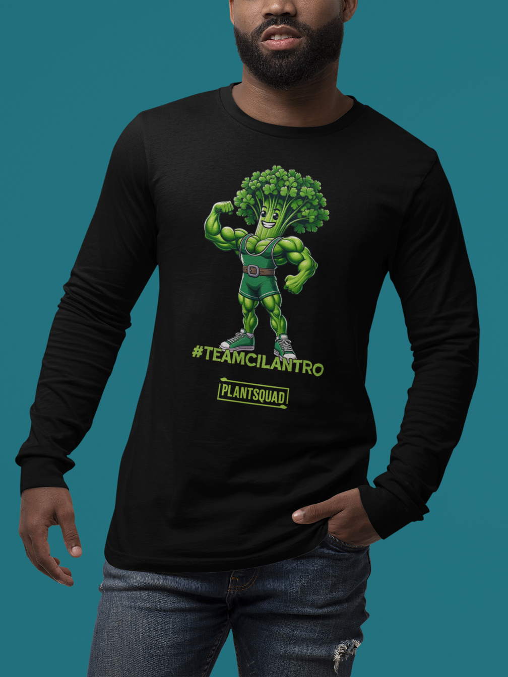 Here's the revised sentence:

A Plantsquad Cilantro "Team Cilantro" - Unisex Long Sleeve T-Shirt featuring an illustration of a muscular anthropomorphic broccoli character wearing a championship belt. Perfect for fitness enthusiasts, the text "#TEAMCILANTRO" is prominently displayed below the character, along with "PLANTSQUAD" in a green box beneath it.