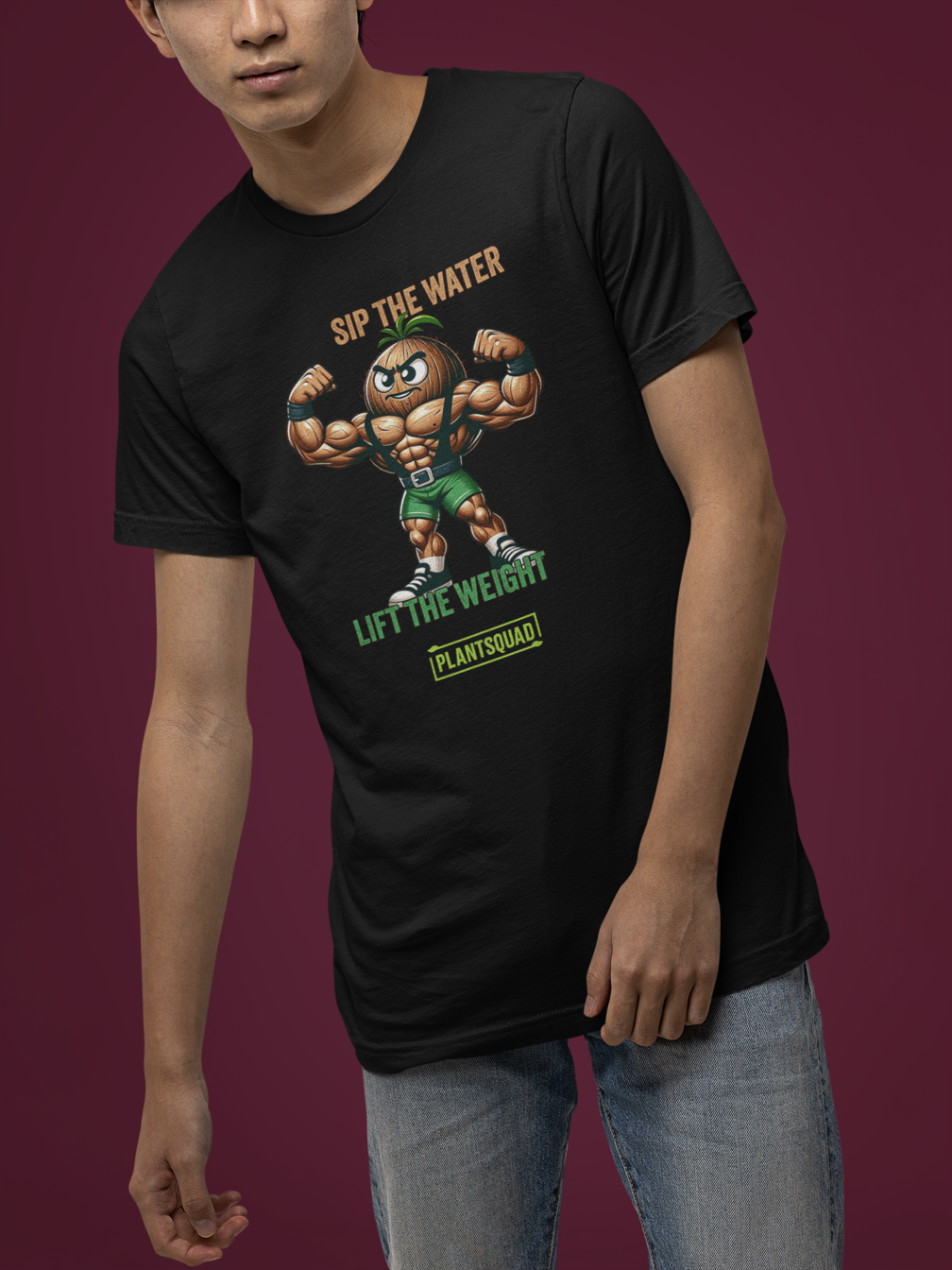 A Plantsquad Coconut "Sip The Water Lift The Weight" - Unisex T-Shirt features an illustration of a muscular, anthropomorphic walnut flexing its biceps. Above the walnut, text reads "SIP THE WATER," and below it, "LIFT THE WEIGHT." At the bottom, the green logo proudly displays "#plantsquad.