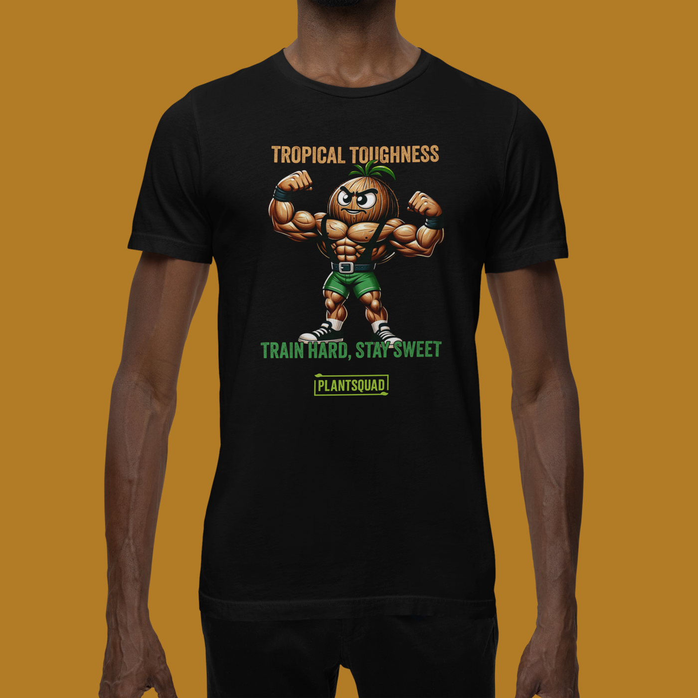 The Plantsquad Coconut "Tropical Toughness Train Hard Stay Sweet" - Unisex T-Shirt showcases a muscular pineapple character flexing in green shorts. Above, bold text declares "Tropical Toughness," while below it encourages "Train Hard, Stay Sweet." The design is complete with "Plantsquad" at the bottom in a vibrant green box.