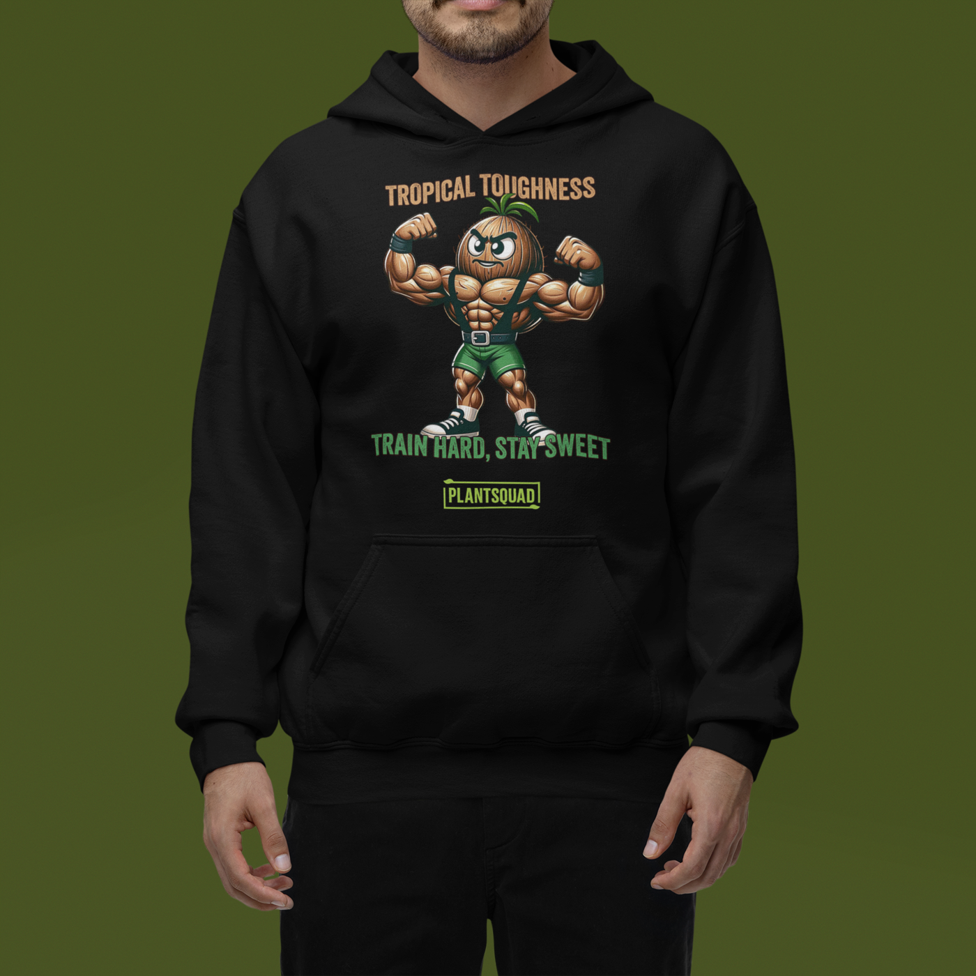 The Plantsquad Coconut "Tropical Toughness Train Hard Stay Sweet" - Unisex Hoodie features a muscular cartoon coconut flexing its biceps, wearing green shorts. Above the coconut, text reads "Tropical Toughness." Below it, text reads "Train Hard, Stay Sweet" with a green banner labeled "PlantSquad." Ideal for those embracing a vegan lifestyle.