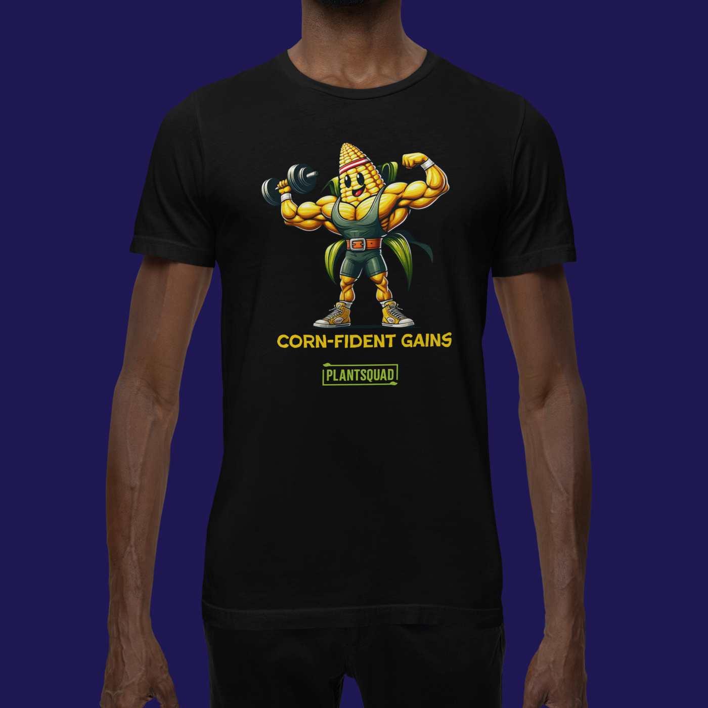 The Plantsquad Corn "Corn-fident Gains" - Unisex T-Shirt showcases a muscular cartoon corn cob sporting a green belt. The text beneath the character reads, "CORN-FIDENT GAINS," with "plantsquad" proudly displayed in a green box below it.