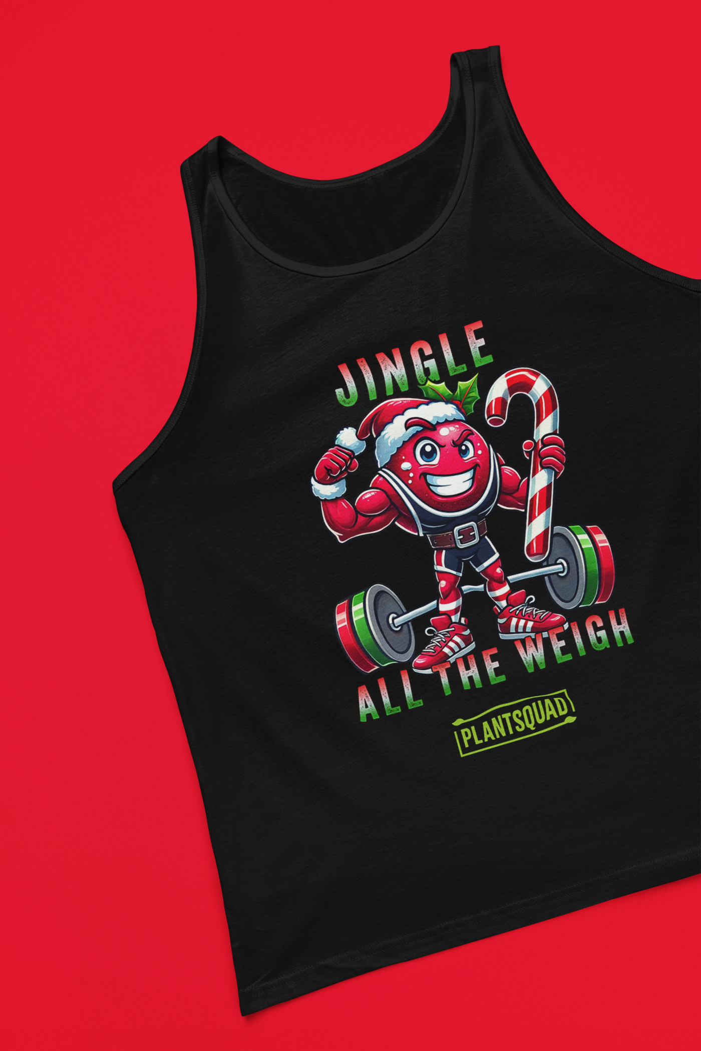 A picture of a tank top featuring a strong looking cranberry cartoon character flexing its arms holding a candy cane.  A small green logo "PLANTSQUAD" appears above the character, "JINGLE ALL THE WEIGH" below. Perfect for those embracing a plant-based or vegan lifestyle that are into fitness