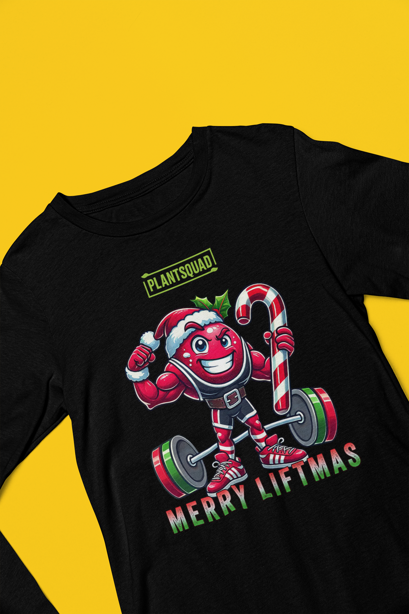 A picture of a tank top featuring a strong looking cranberry cartoon character flexing its arms holding a candy cane.  A small green logo "PLANTSQUAD" appears above the character, "MERRY LIFTMAS" below. Perfect for those embracing a plant-based or vegan lifestyle that are into fitness