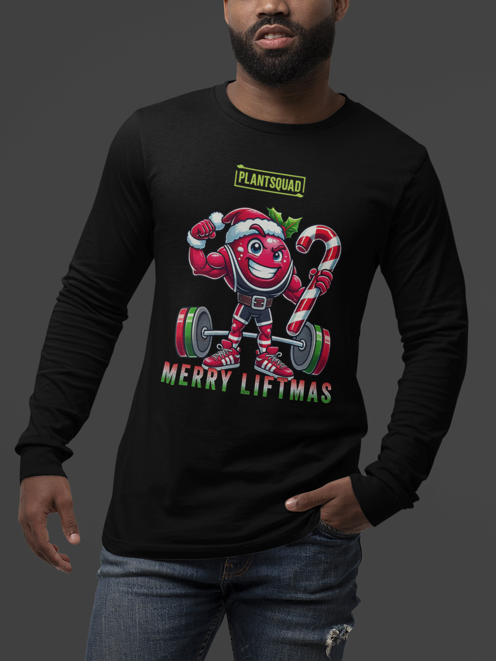 A model featuring a muscled cranberry cartoon character flexing its arms holding a candy cane.  A small green logo "PLANTSQUAD" appears above the character, "MERRY LIFTMAS" below. Perfect for those embracing a plant-based or vegan lifestyle that are into fitness