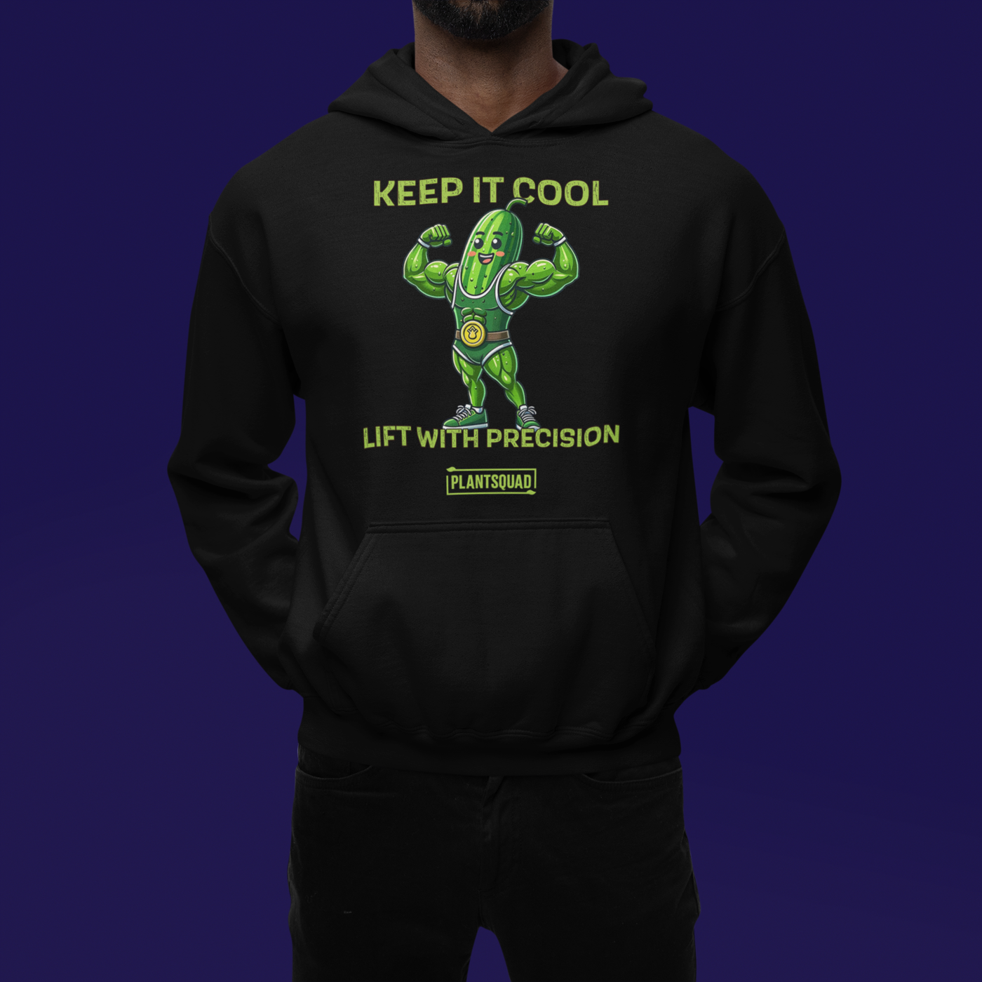 A black hoodie featuring a muscular green pickle character flexing its arms. Above the character, it says "KEEP IT COOL," and below, "LIFT WITH PRECISION." The word "PLANTSQUAD" is written on a banner beneath the pickle, perfect for those embracing a plant-based vegan lifestyle while weight lifting—this is the Plantsquad Cucumber "Keep It Cool Lift With Precision" - Unisex Hoodie.