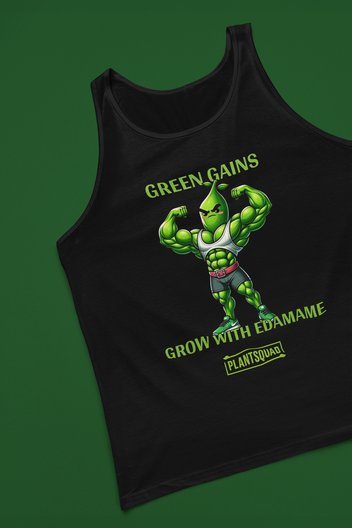 A black tank top showcases a muscly edamame bean character flexing, with the text "GREEN GAINS GROW WITH EDAMAME" above and below it, perfect for those embracing a plant-based lifestyle. Plantsquad Edamame "Green Gains Grow With Edamame" - Unisex Tank Top is marked at the bottom on a yellow tag.