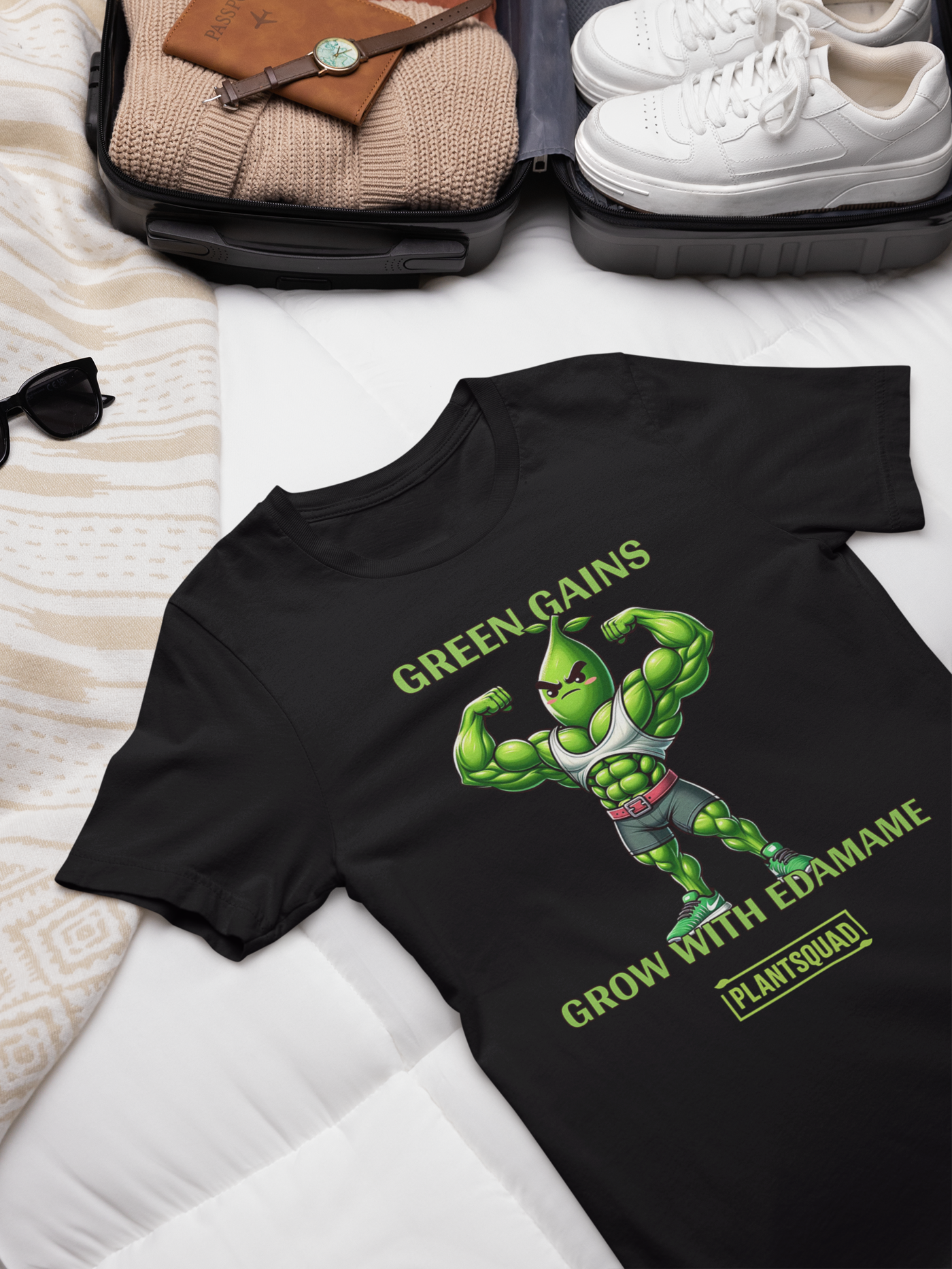 A Plantsquad Edamame "Green Gains Grow With Edamame" - Unisex T-Shirt featuring a flexing anthropomorphic edamame character with muscular arms. The text above reads "GREEN GAINS" and below "GROW WITH EDAMAME." The bottom text, showcased in a small, yellow box, proudly displays "plantsquad".