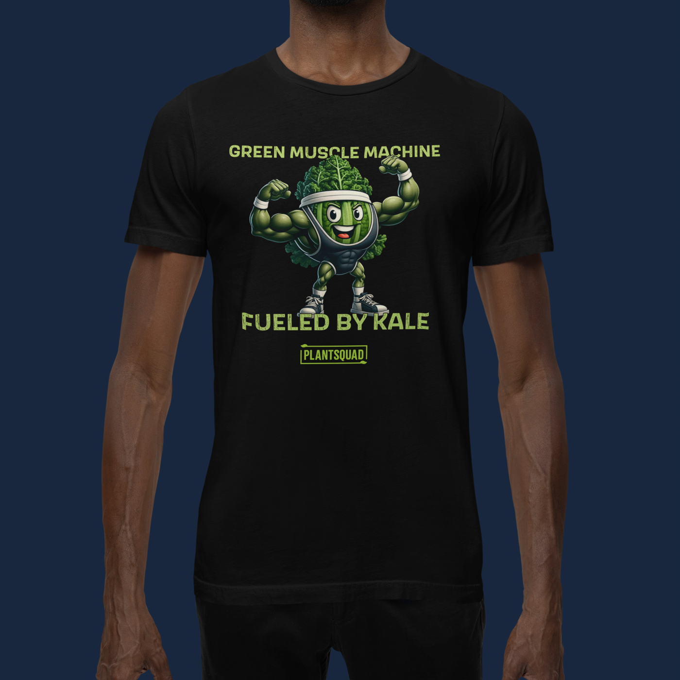 Plantsquad Kale "Green Muscle Machine Fueled By Kale" - Unisex T-Shirt featuring a cartoon kale character with muscular arms, flexing and smiling. The shirt displays the text "GREEN MUSCLE MACHINE" above the character and "FUELED BY KALE" below. Proudly wear your "PLANTSQUAD" mantra at the bottom of this unique design.
